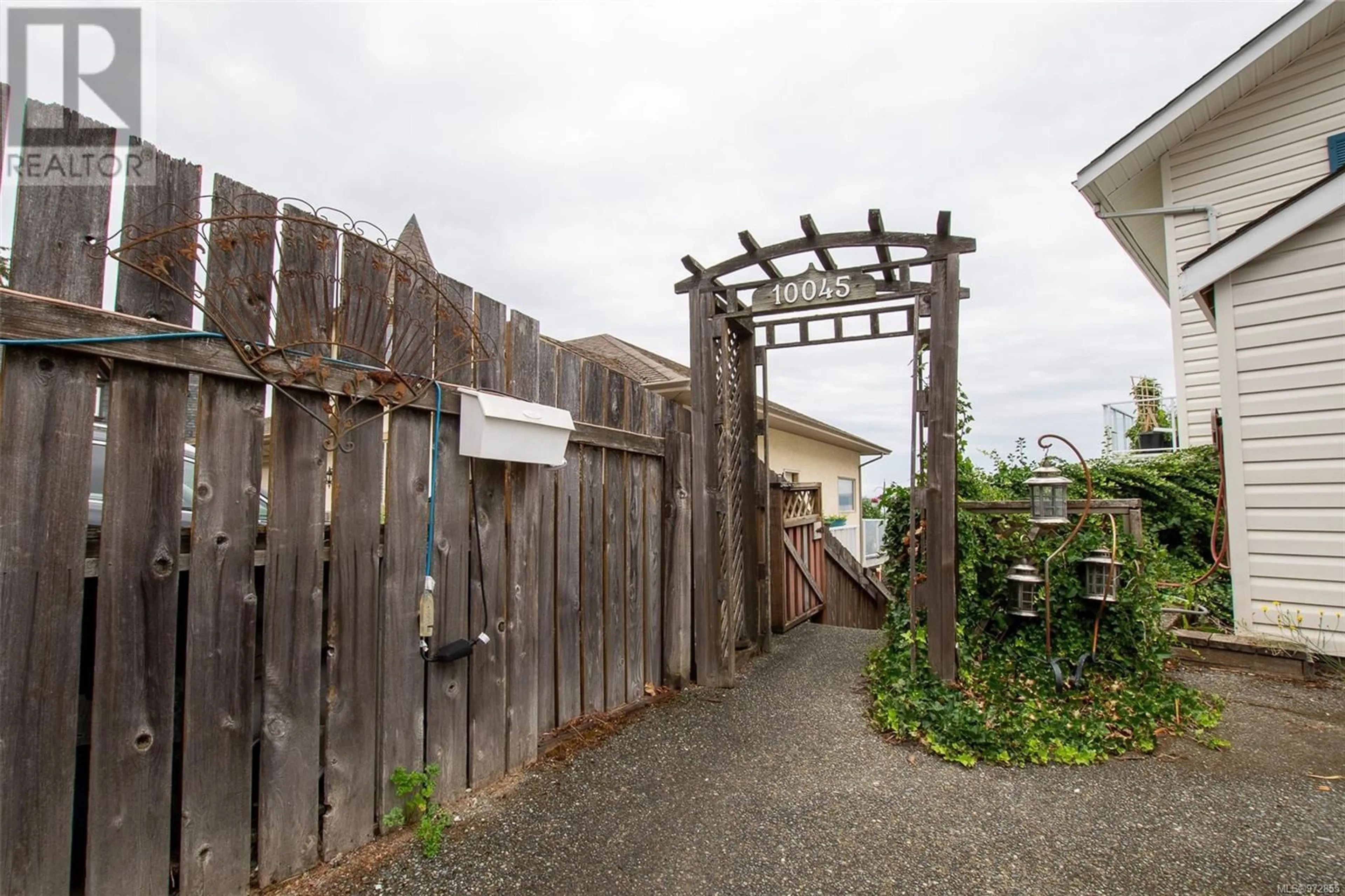 Patio, the fenced backyard for 10045 Beach Dr, Chemainus British Columbia V0R1K1