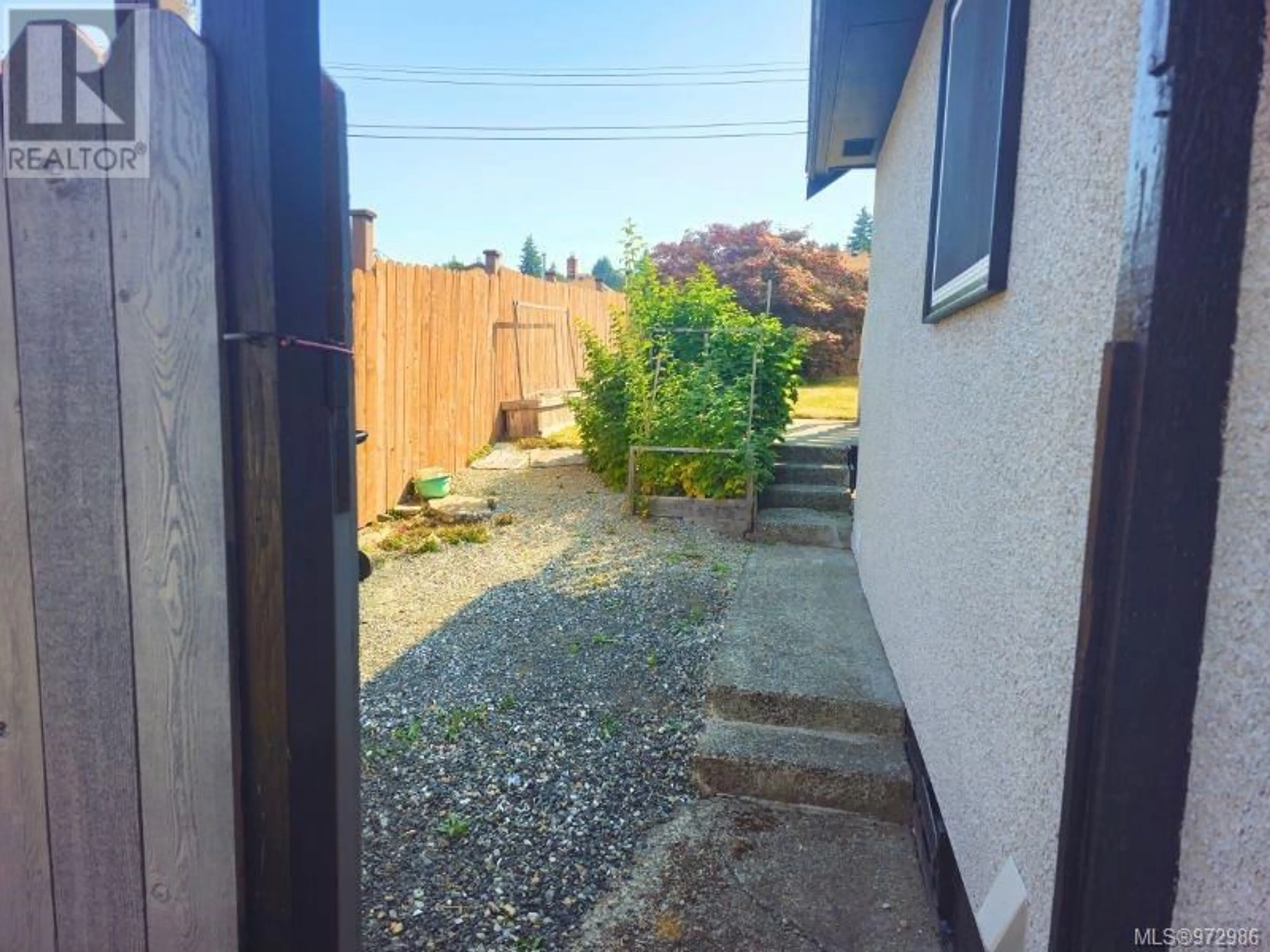 Patio, the fenced backyard for 2457 9th Ave, Port Alberni British Columbia V9Y2N2