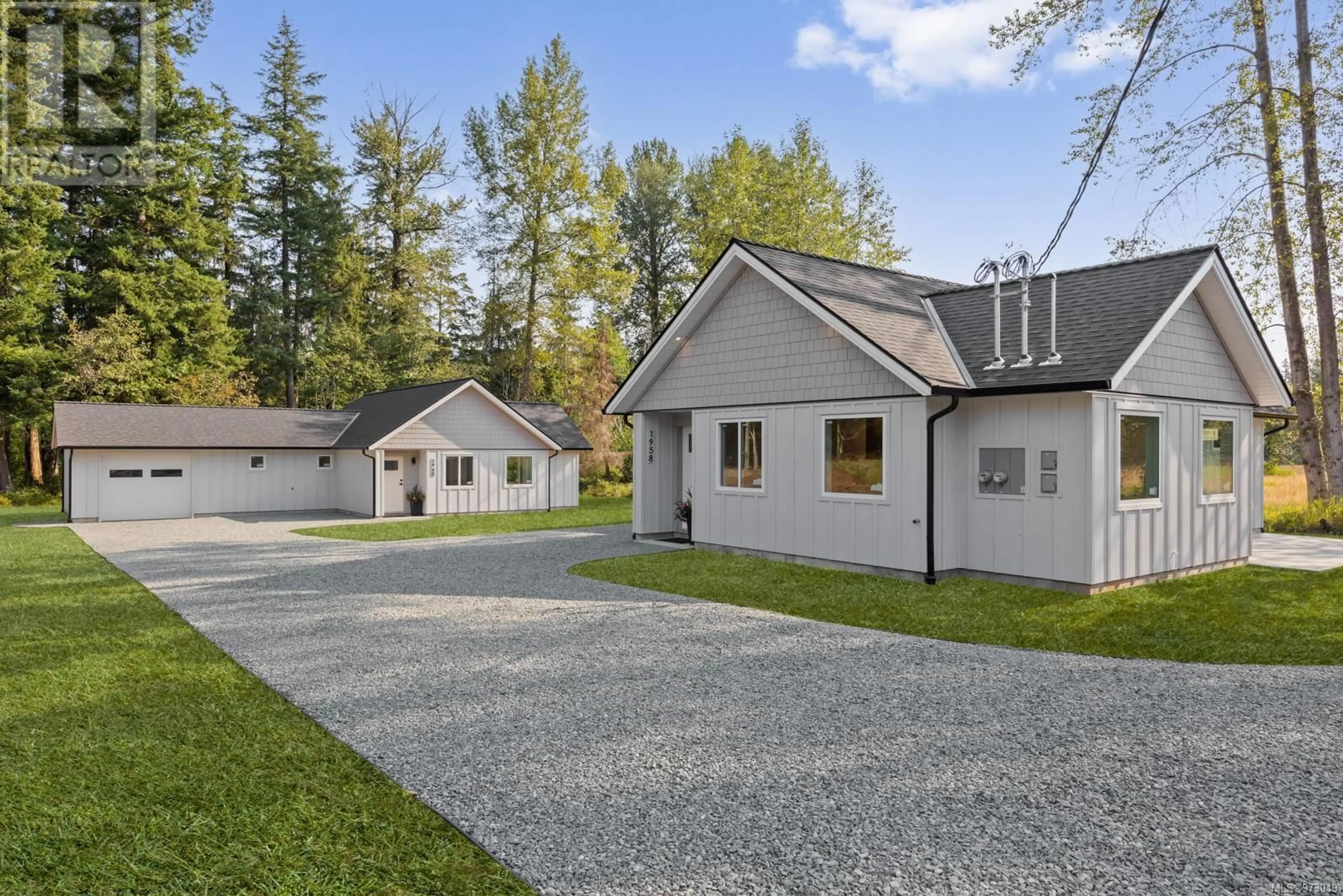 Frontside or backside of a home, cottage for 1958 1960 Wilfred Rd, Black Creek British Columbia V9J1J8