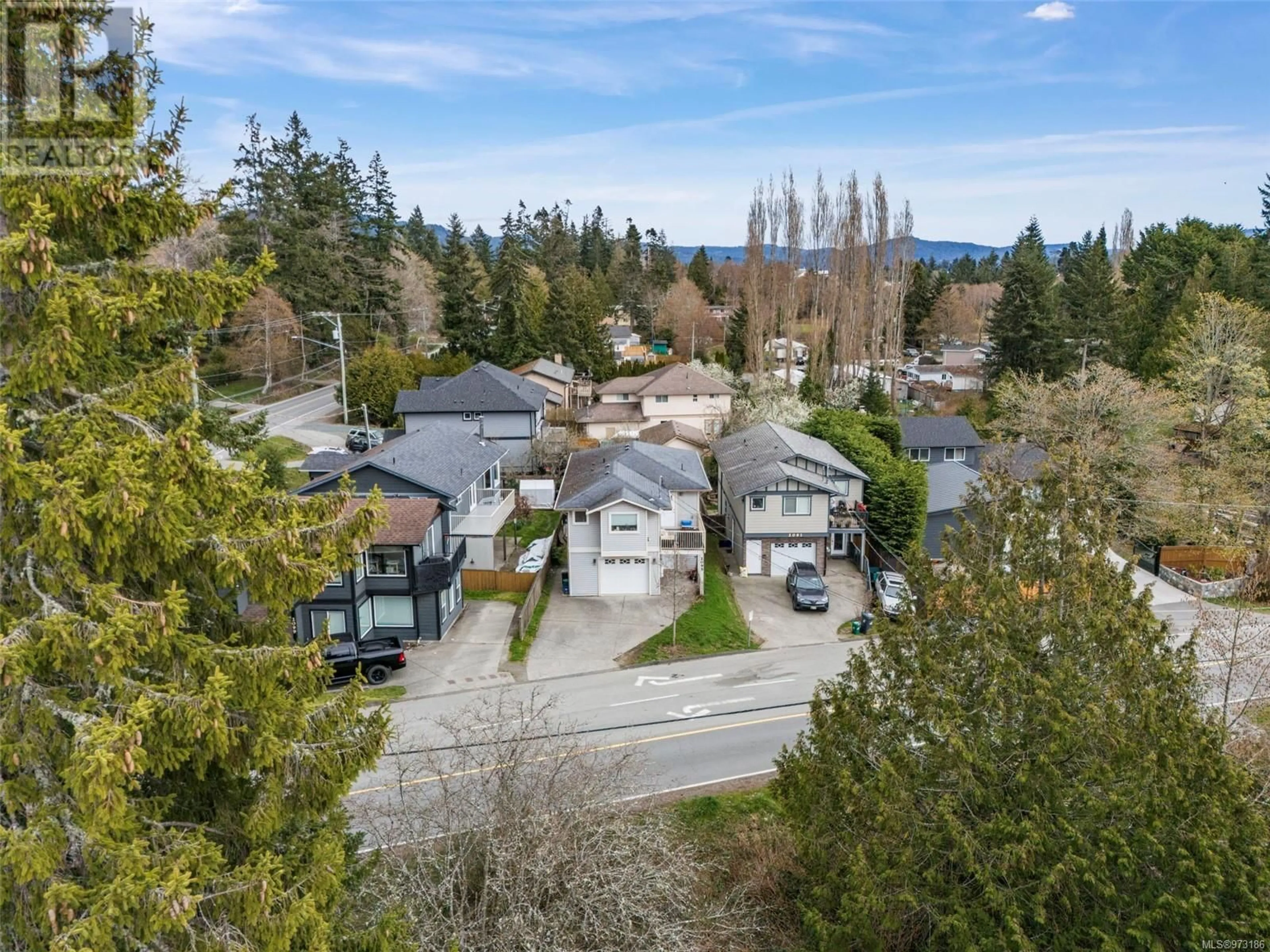 Frontside or backside of a home, the street view for 2095 Maple Ave S, Sooke British Columbia V9Z0N8