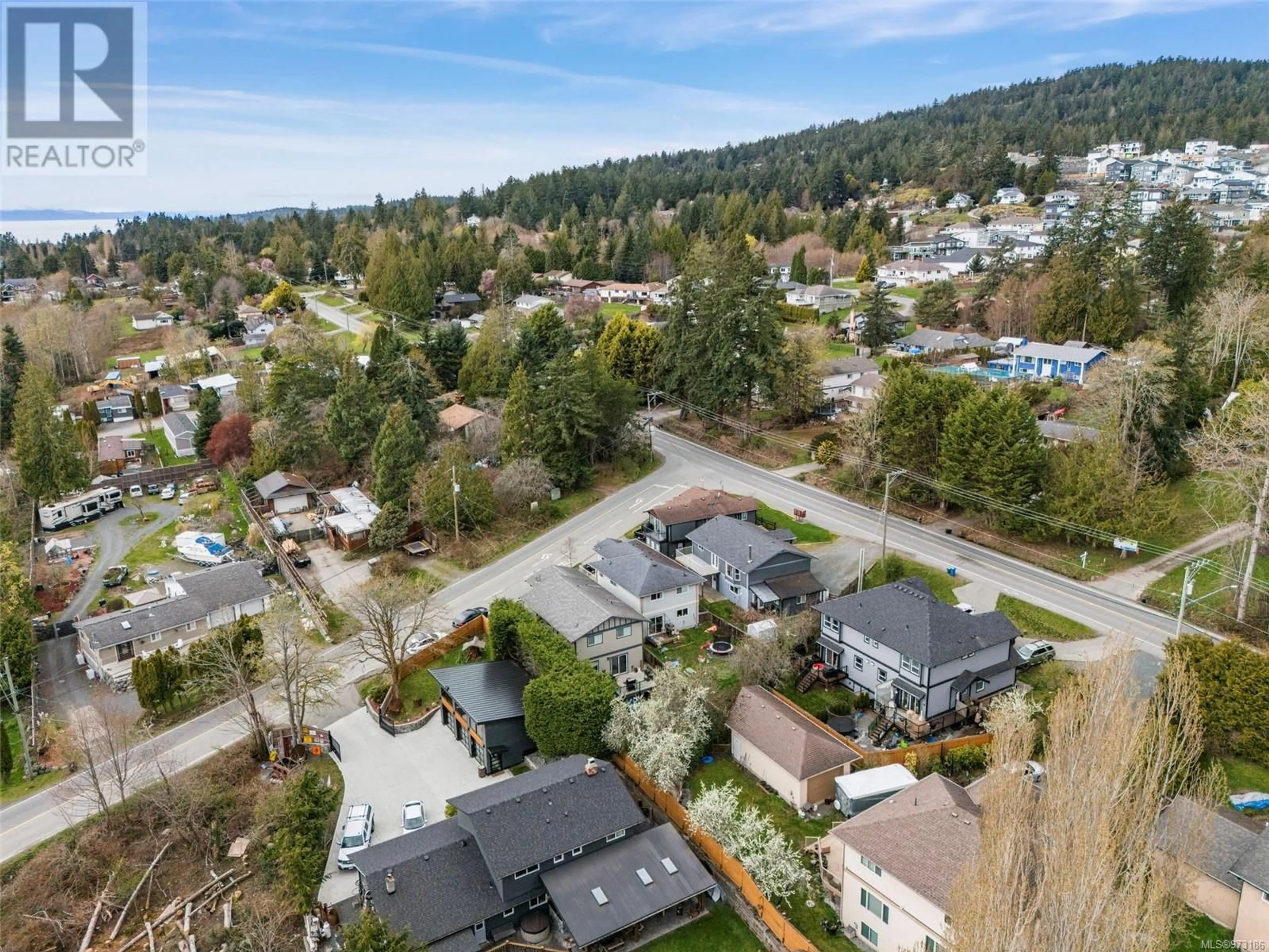 Frontside or backside of a home, the street view for 2095 Maple Ave S, Sooke British Columbia V9Z0N8