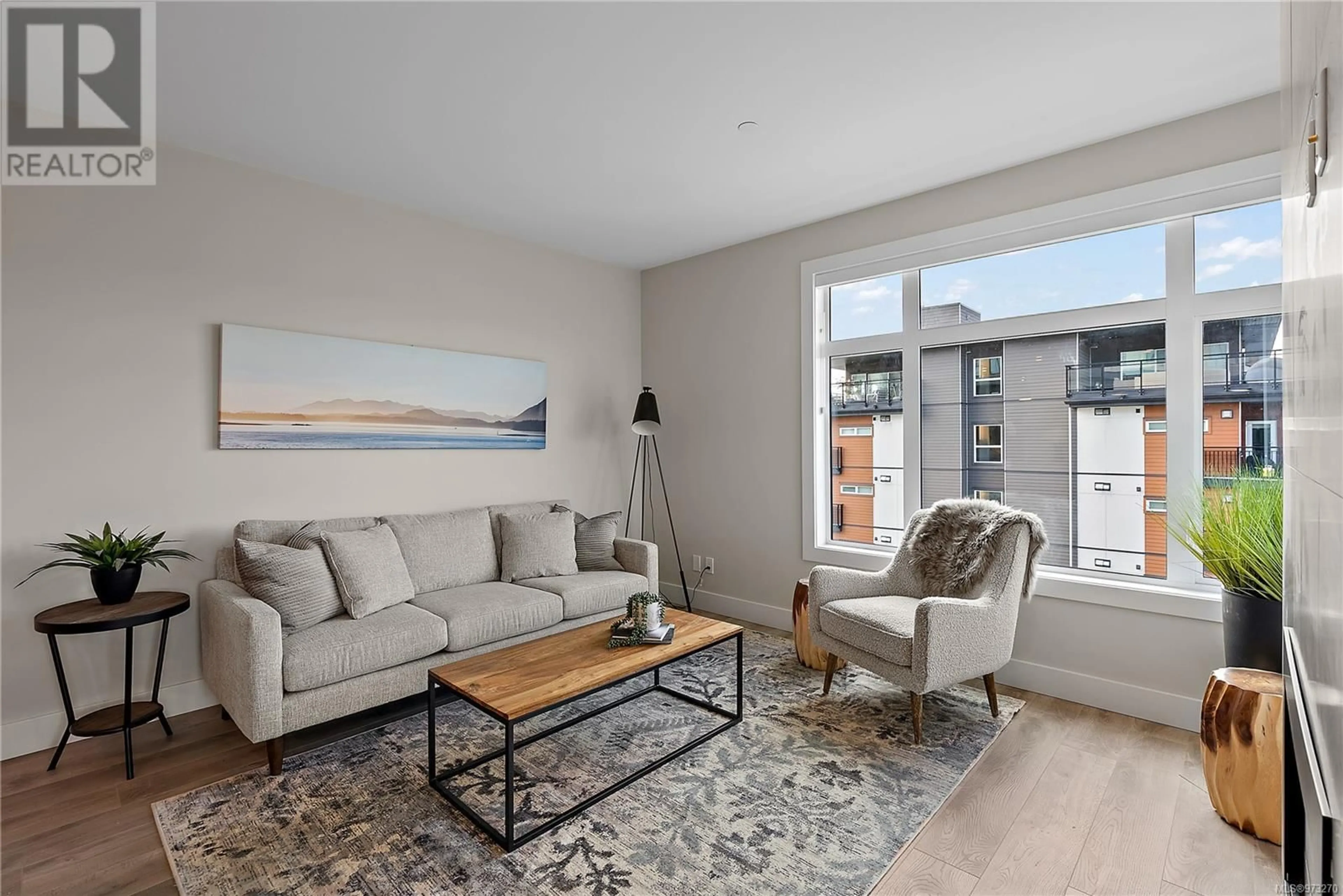 Living room, wood floors for 603 2520 Hackett Cres, Central Saanich British Columbia V8M0B9