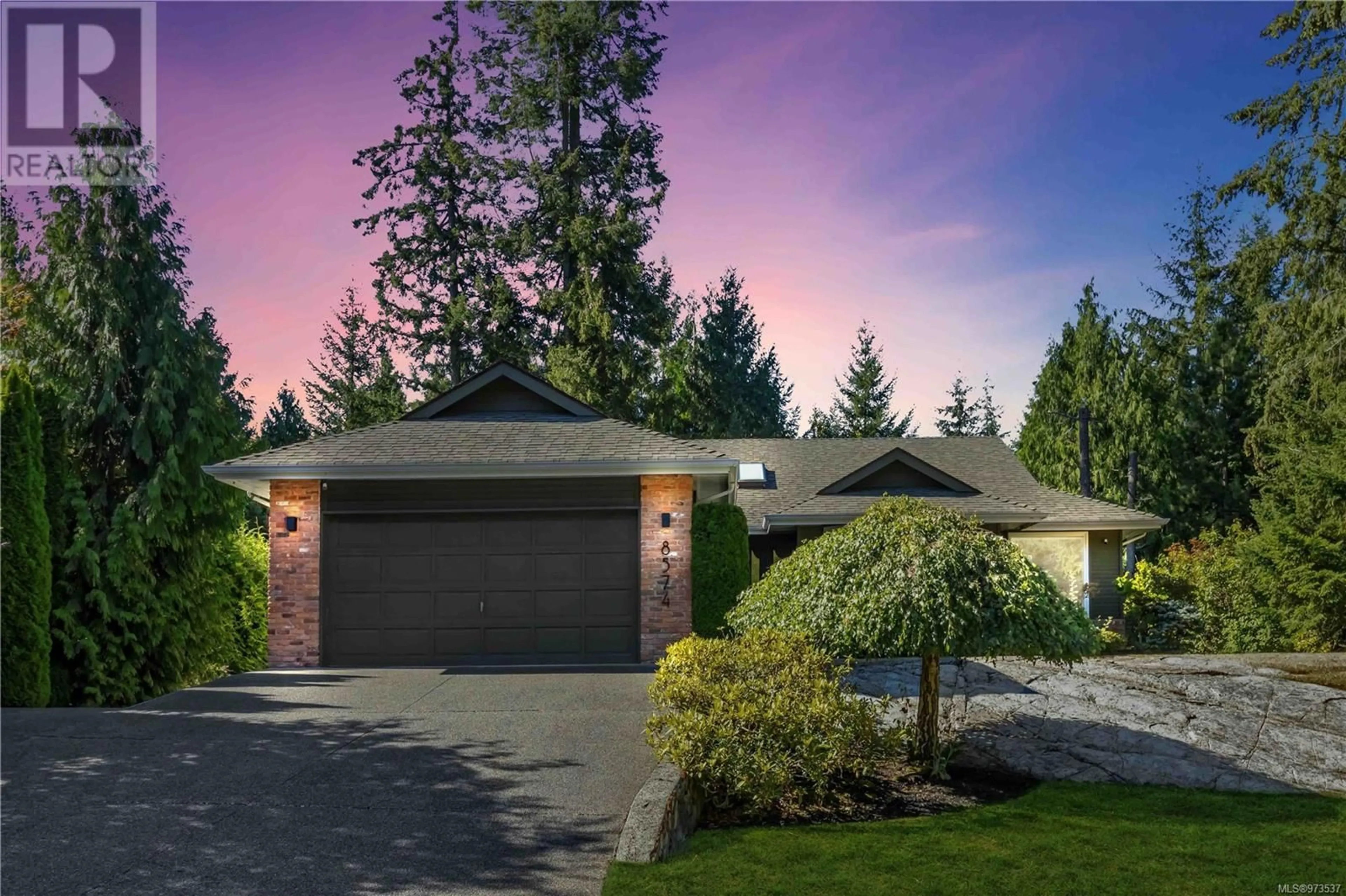 Home with brick exterior material for 8574 KINGCOME Cres, North Saanich British Columbia V8L5B6