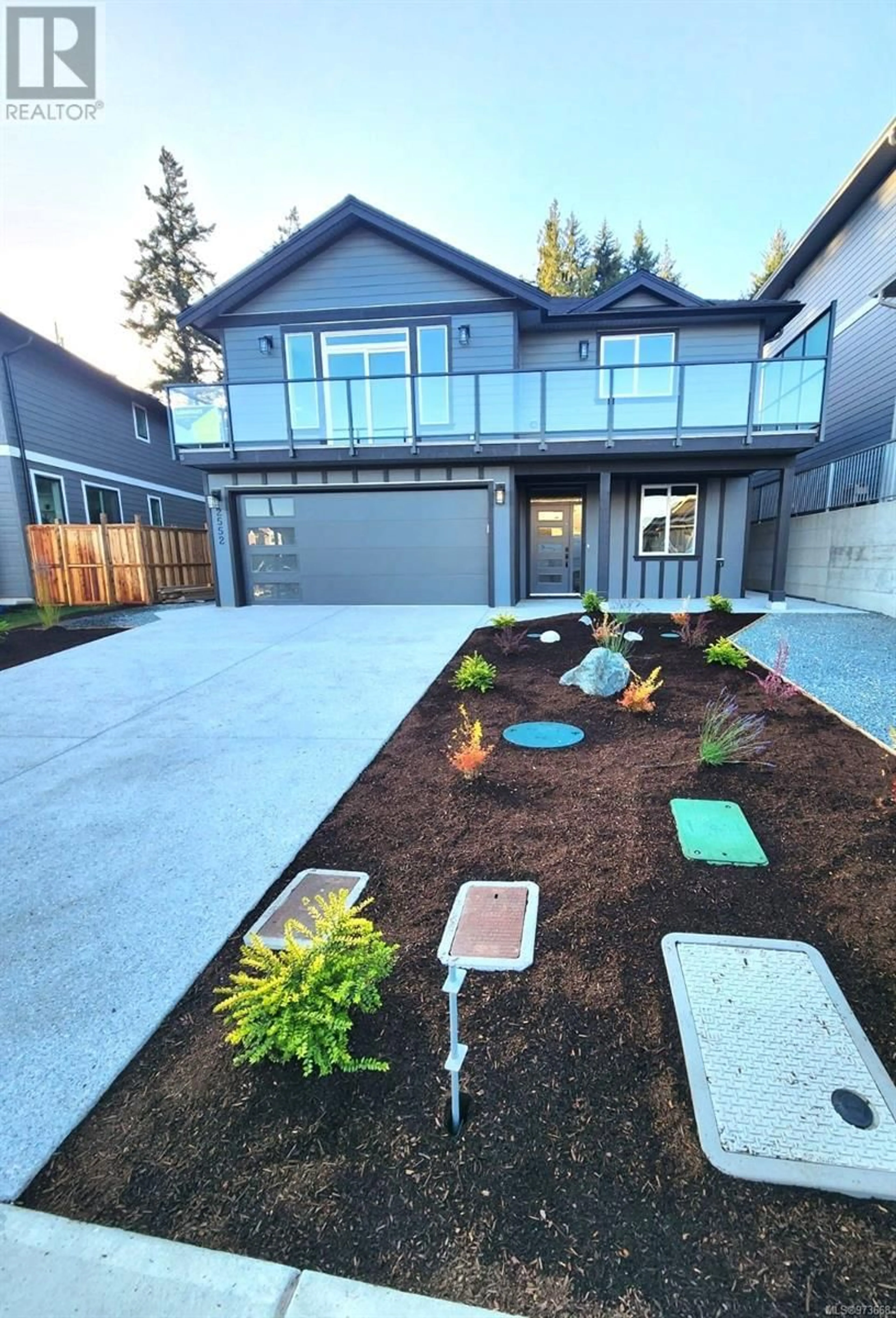 Frontside or backside of a home, the fenced backyard for 2552 Nickson Way, Sooke British Columbia V9Z0Y7