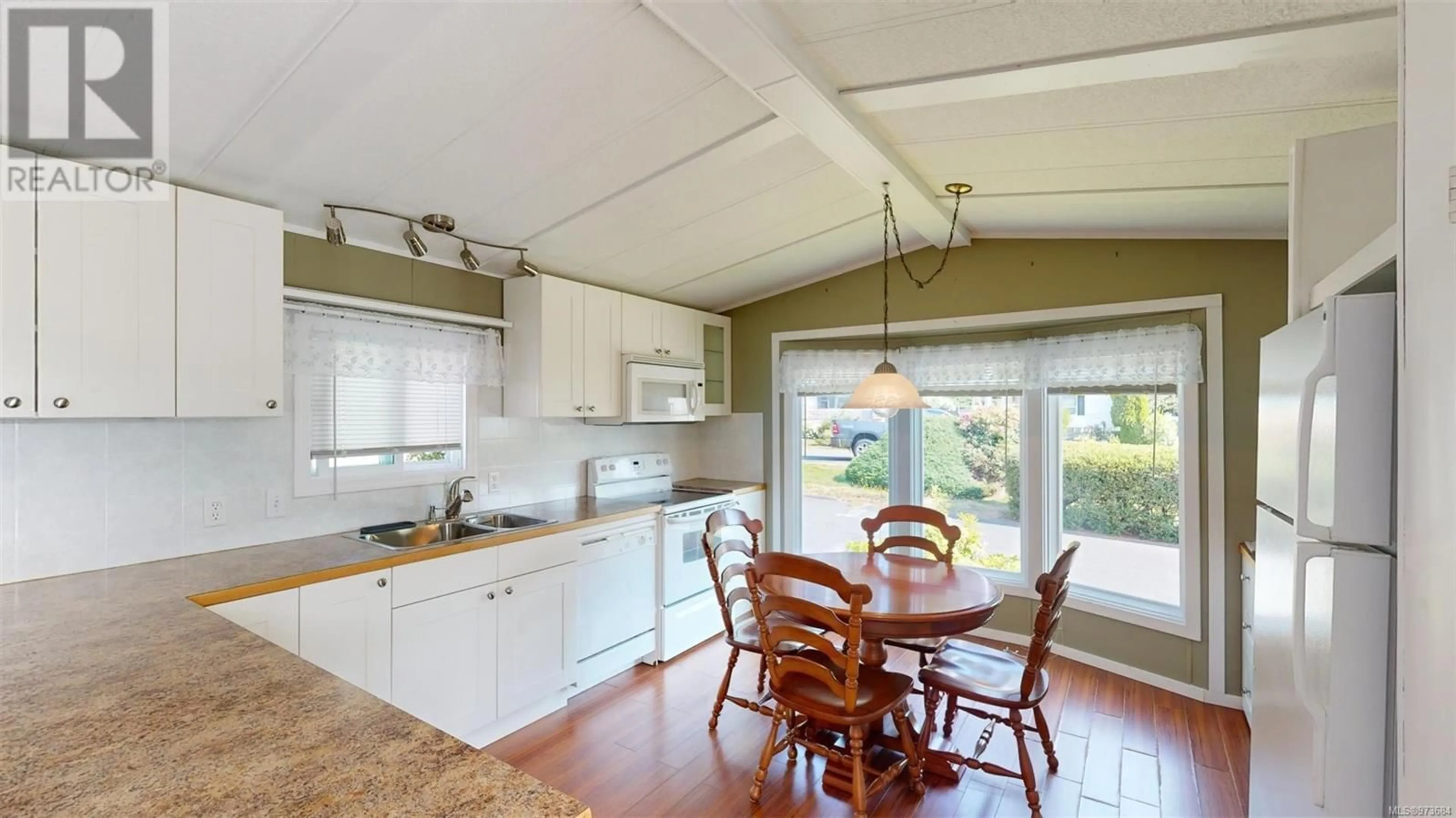 Standard kitchen, wood floors, cottage for 224 2465 Apollo Dr, Nanoose Bay British Columbia V9P9K2