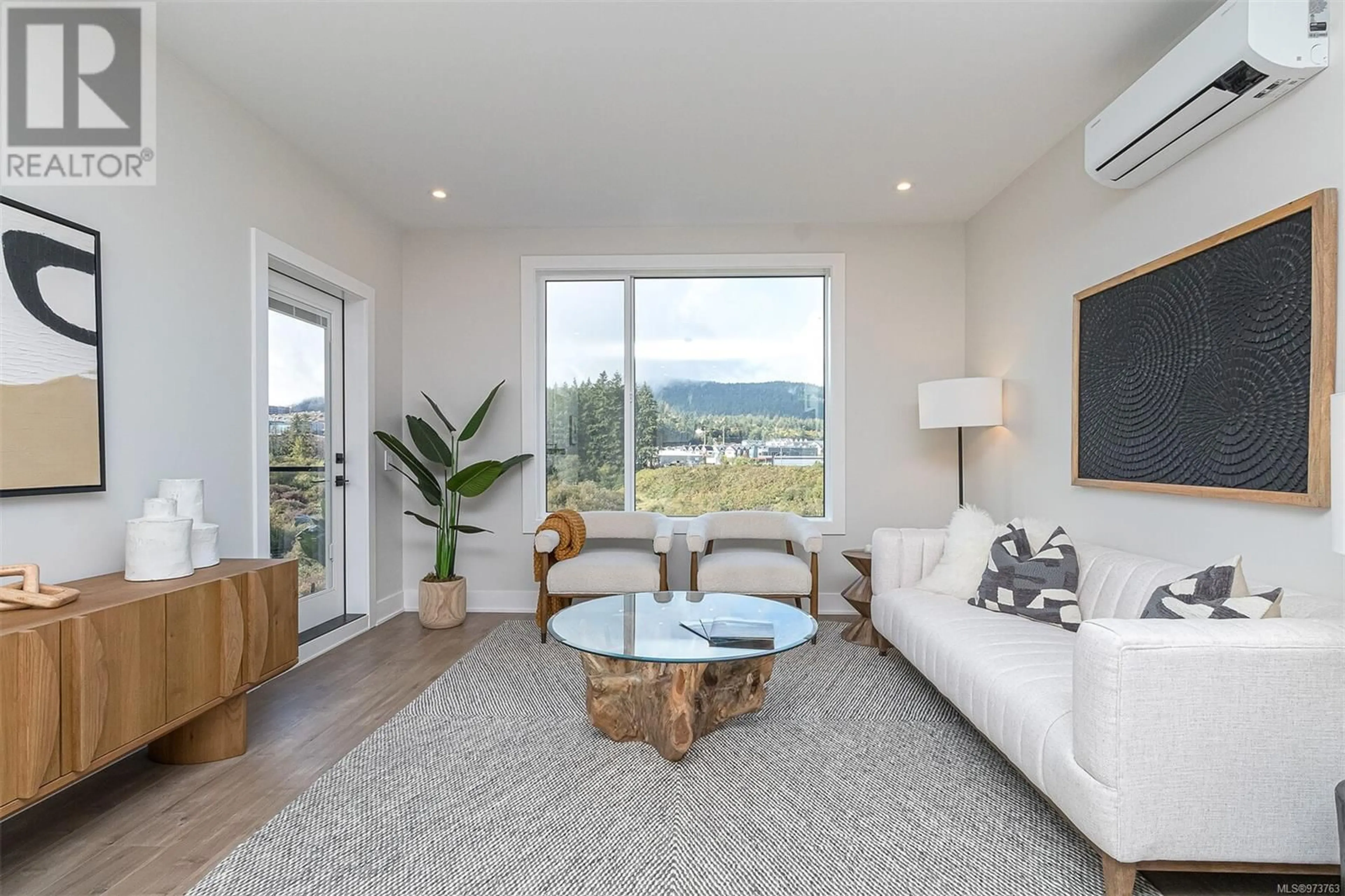 Living room, wood floors for 311 1361 Goldstream Ave, Langford British Columbia V9B7B4