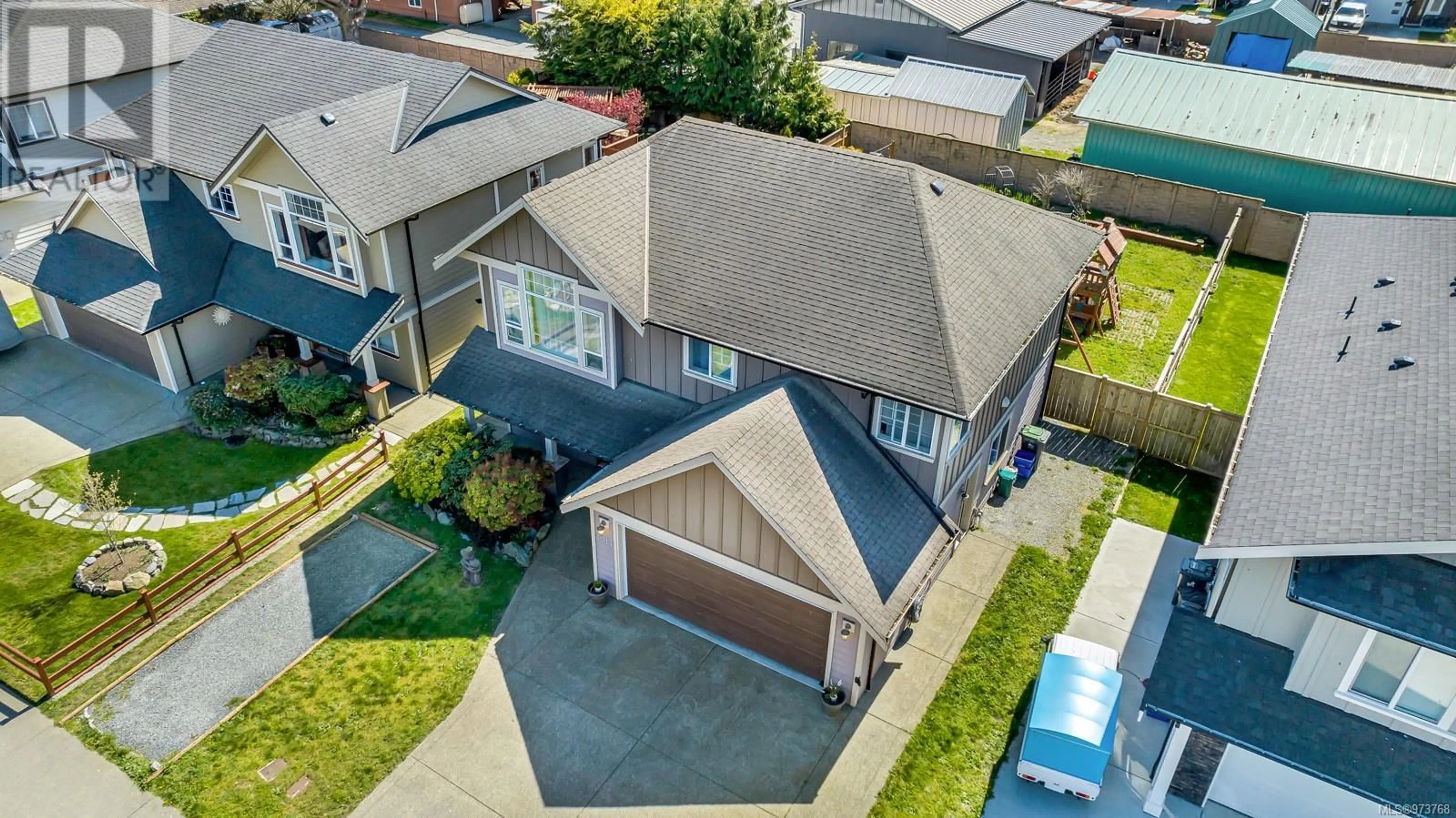 Frontside or backside of a home, the street view for 1017 Sandalwood Crt, Langford British Columbia V9C0E1