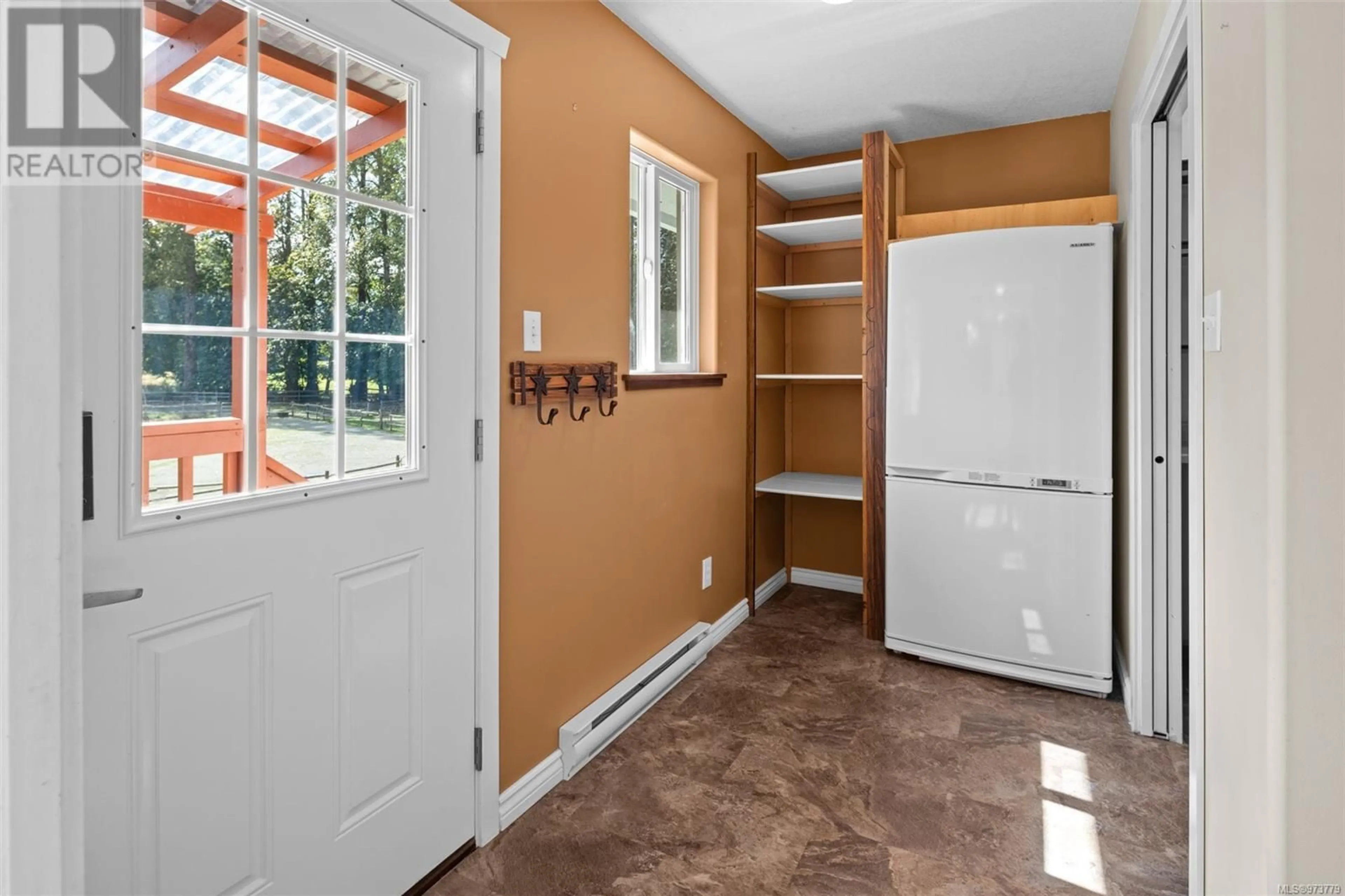 Indoor entryway, wood floors for 4820 Marshall Rd, Duncan British Columbia V9L6T3