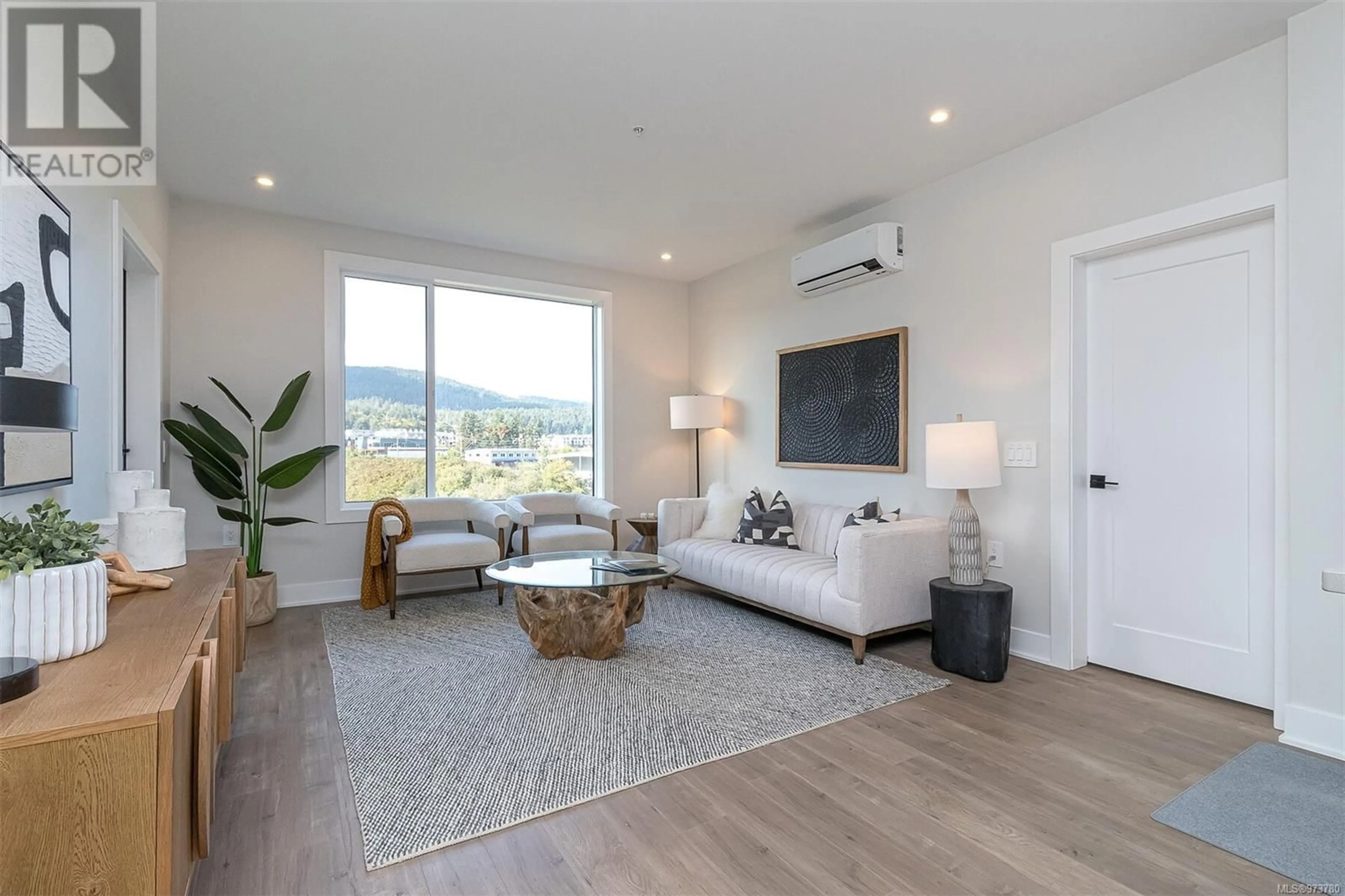 Living room, wood floors for 415 1361 Goldstream Ave, Langford British Columbia V9B7B4