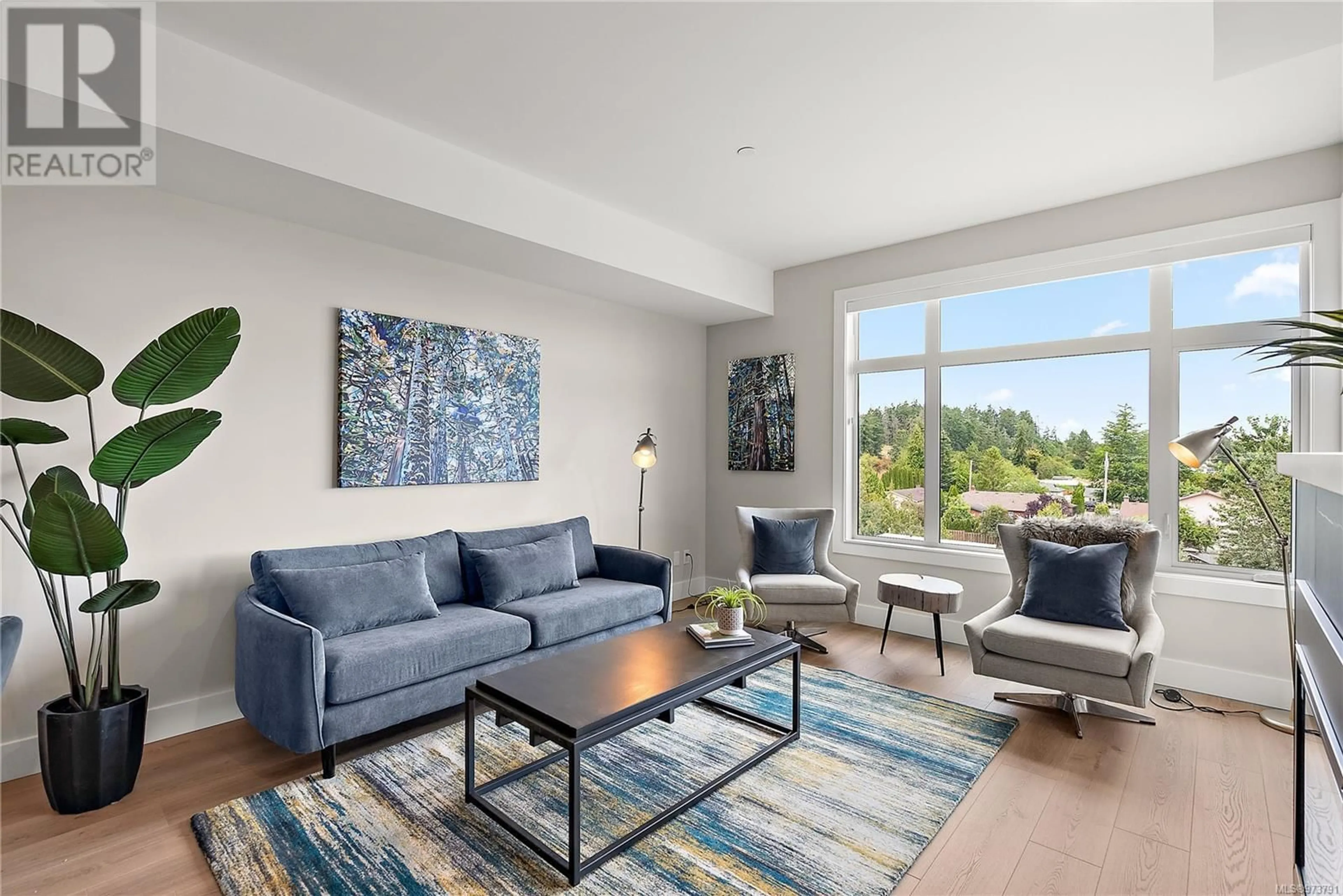 Living room, wood floors for 307 2520 Hackett Cres, Central Saanich British Columbia V8M0B9