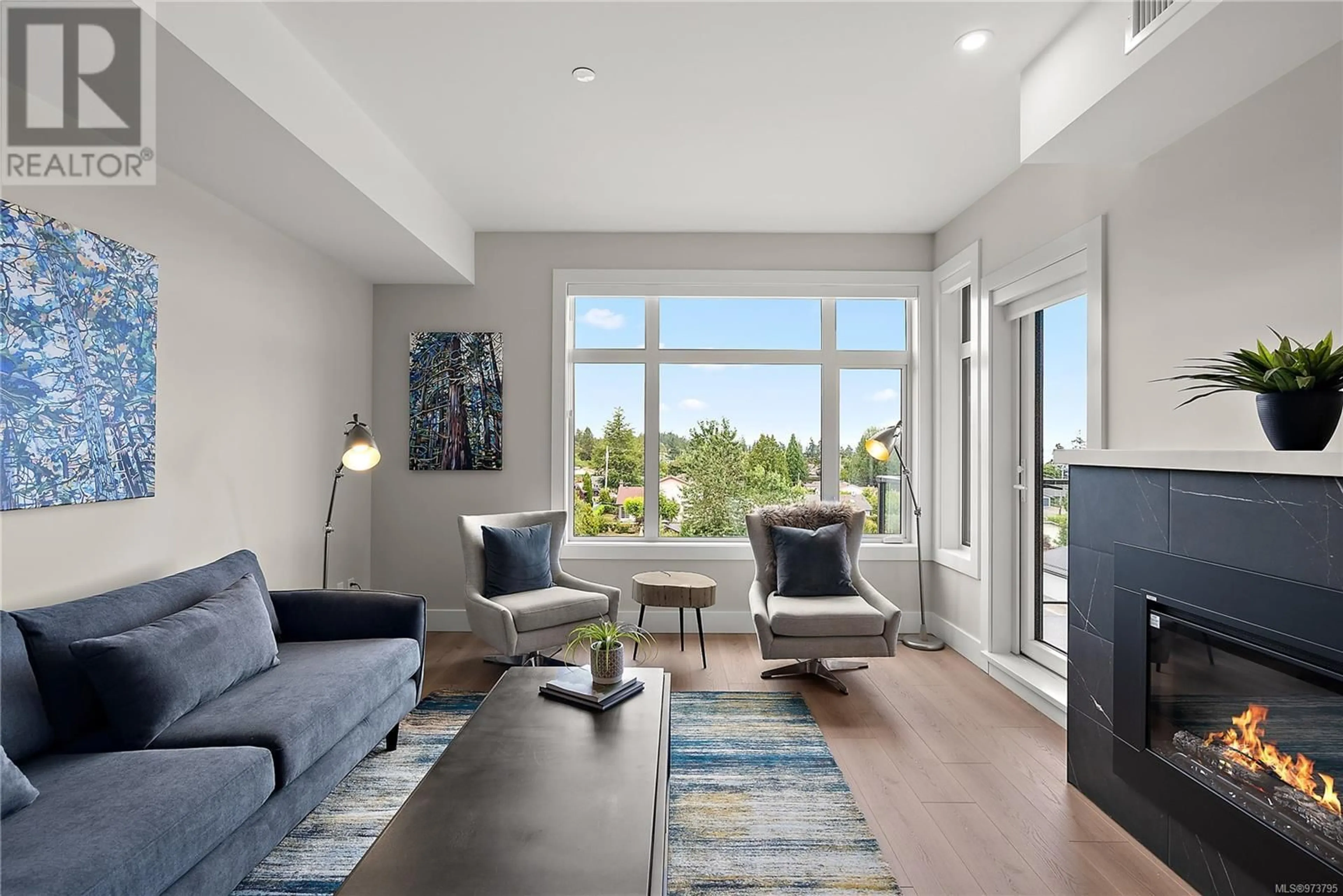 Living room, wood floors for 406 2520 Hackett Cres, Central Saanich British Columbia V8M0B9