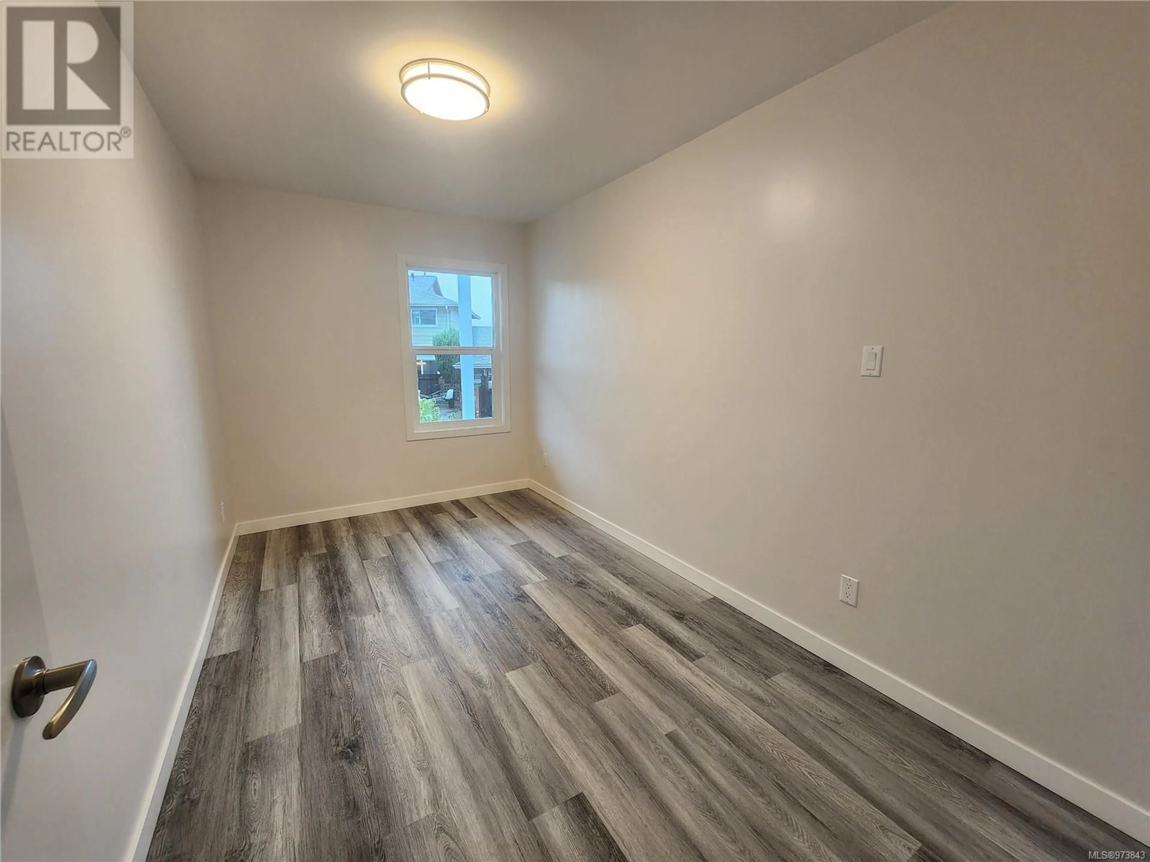 A pic of a room, wood floors for 69 Mckay Cres, Port Alice British Columbia V0N2N0