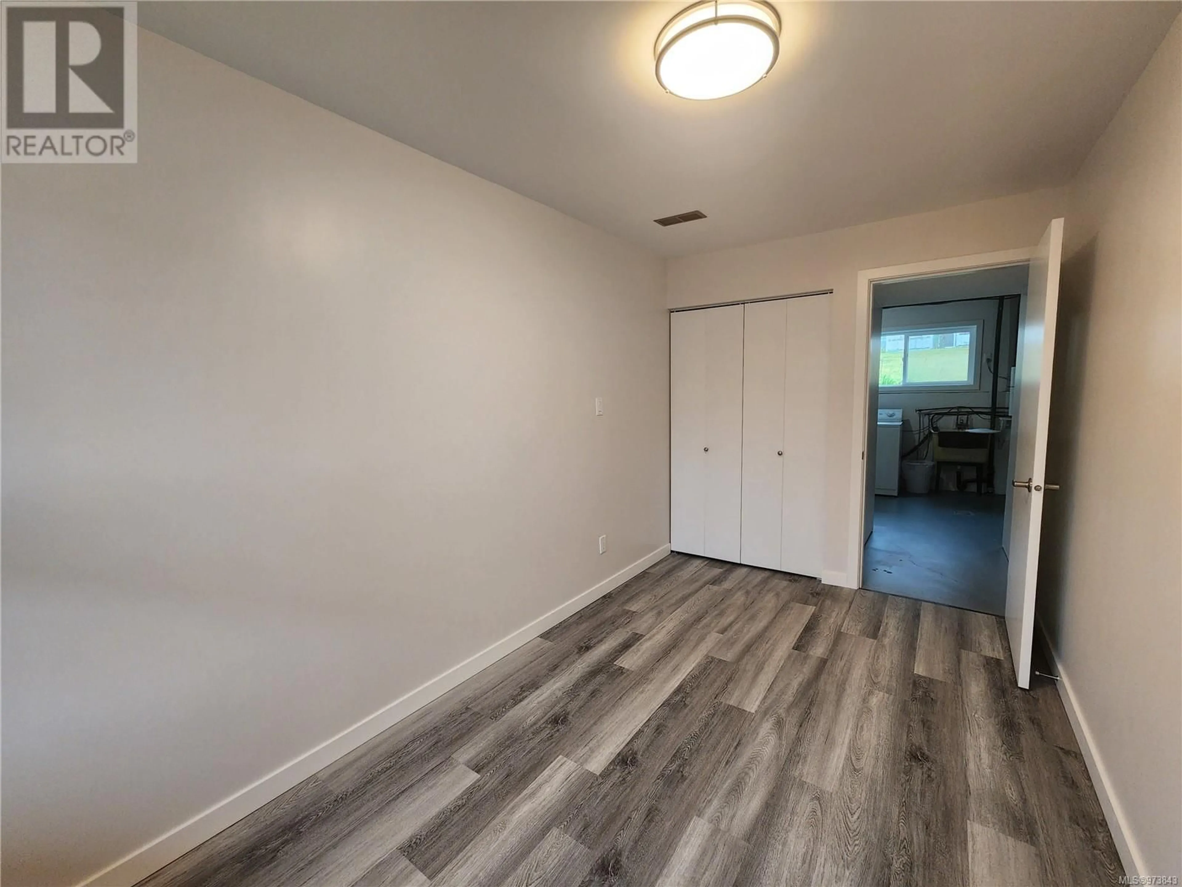 A pic of a room, wood floors for 69 Mckay Cres, Port Alice British Columbia V0N2N0