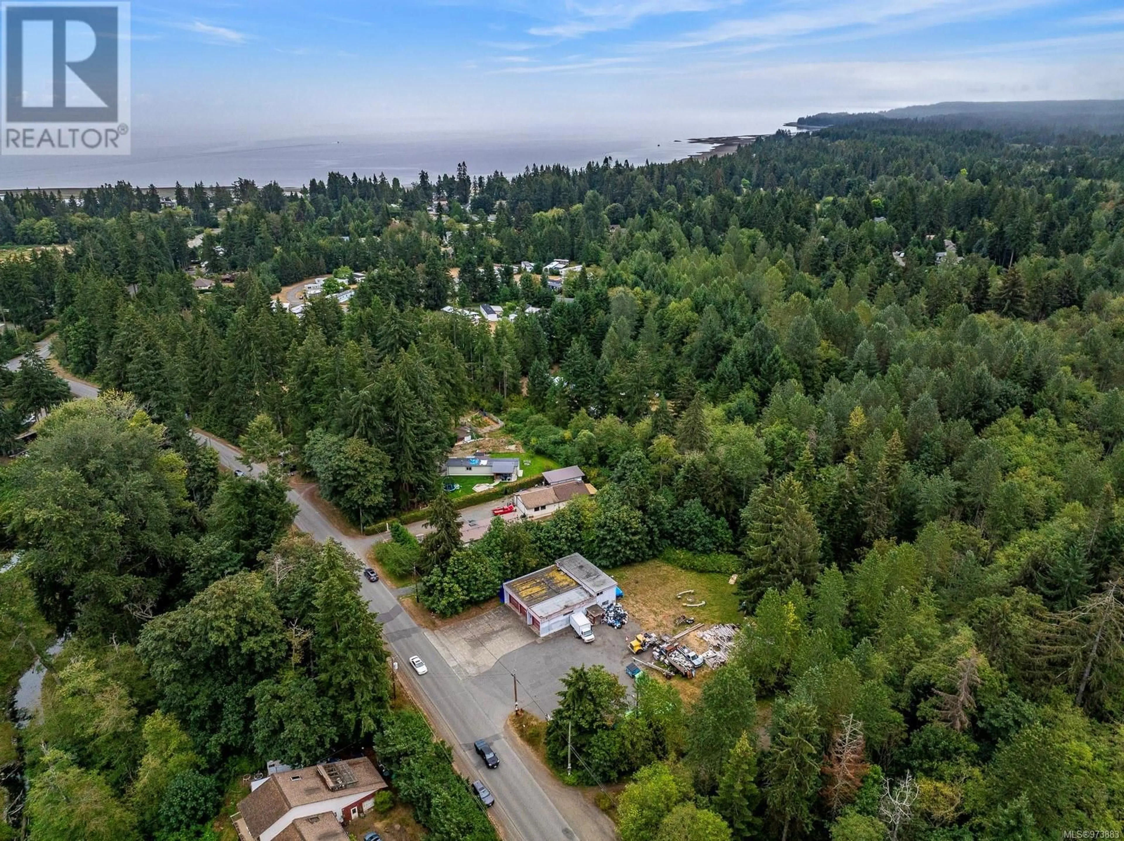 A pic from outside/outdoor area/front of a property/back of a property/a pic from drone, forest/trees view for 2185 REGENT ROAD, Black Creek British Columbia V9W3S4