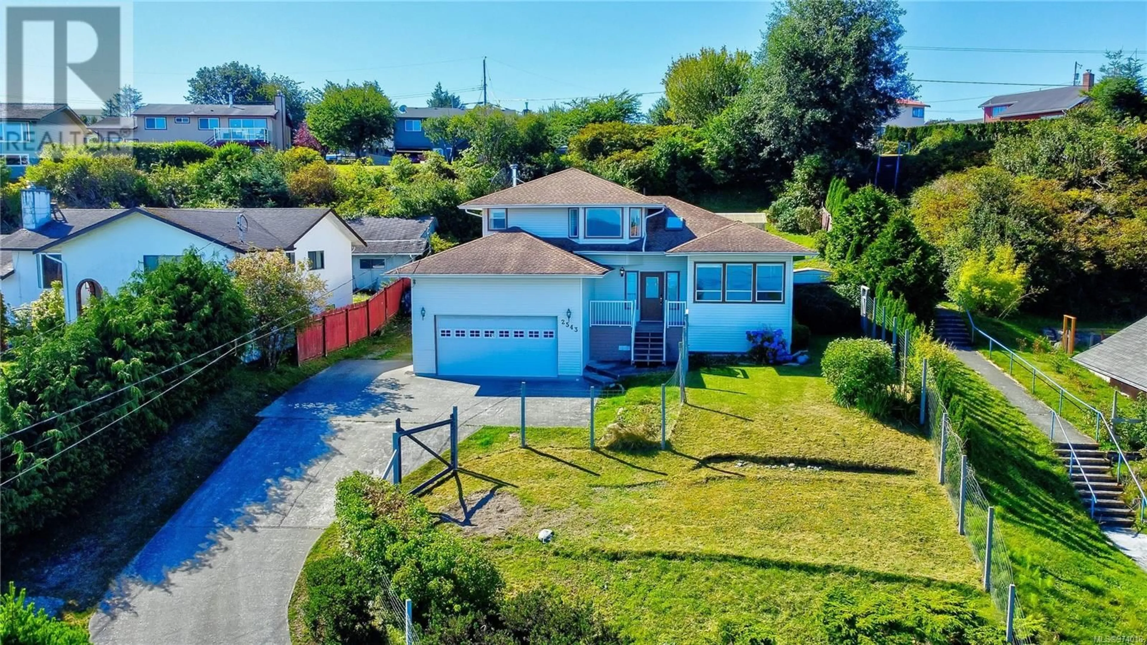A pic from outside/outdoor area/front of a property/back of a property/a pic from drone, street for 2543 CARDENA CRESCENT, Port McNeill British Columbia V0N2R0