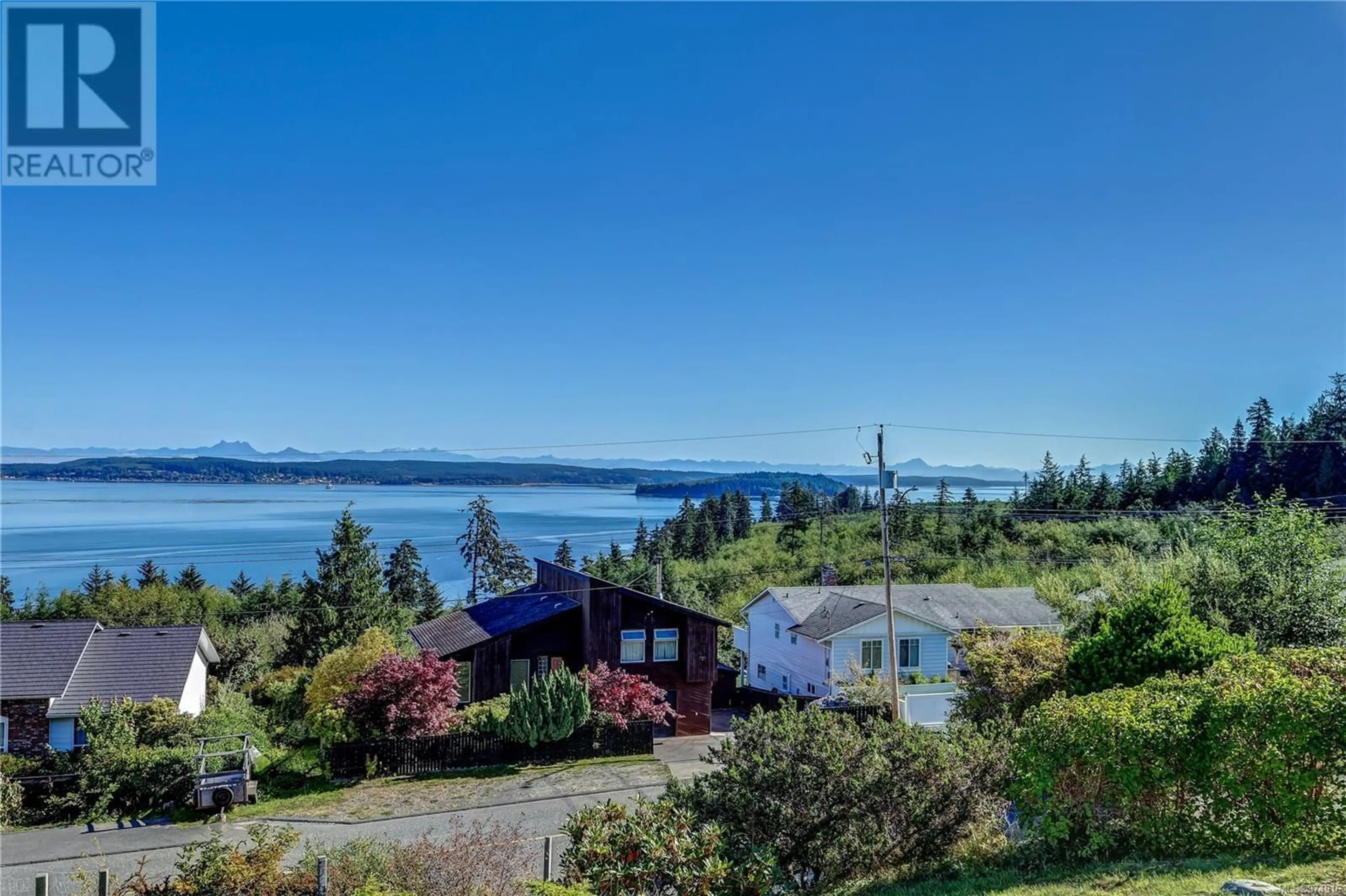A pic from outside/outdoor area/front of a property/back of a property/a pic from drone, water/lake/river/ocean view for 2543 CARDENA CRESCENT, Port McNeill British Columbia V0N2R0