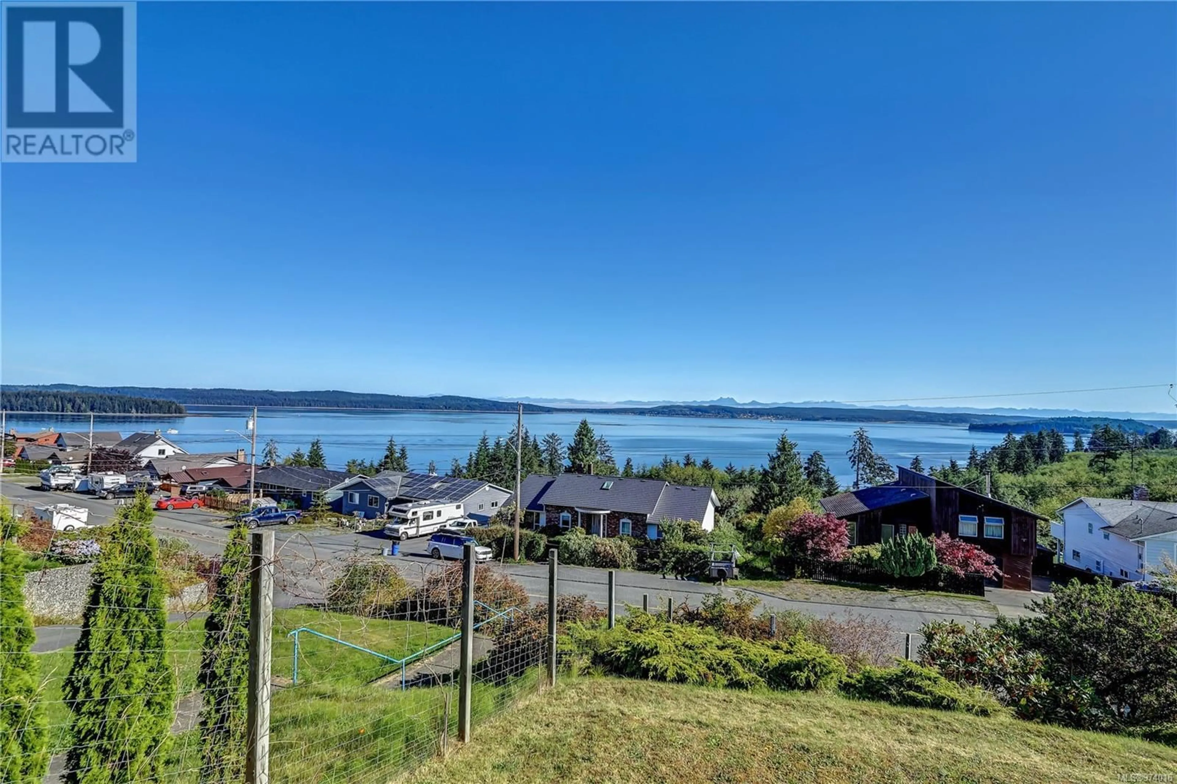 A pic from outside/outdoor area/front of a property/back of a property/a pic from drone, water/lake/river/ocean view for 2543 CARDENA CRESCENT, Port McNeill British Columbia V0N2R0