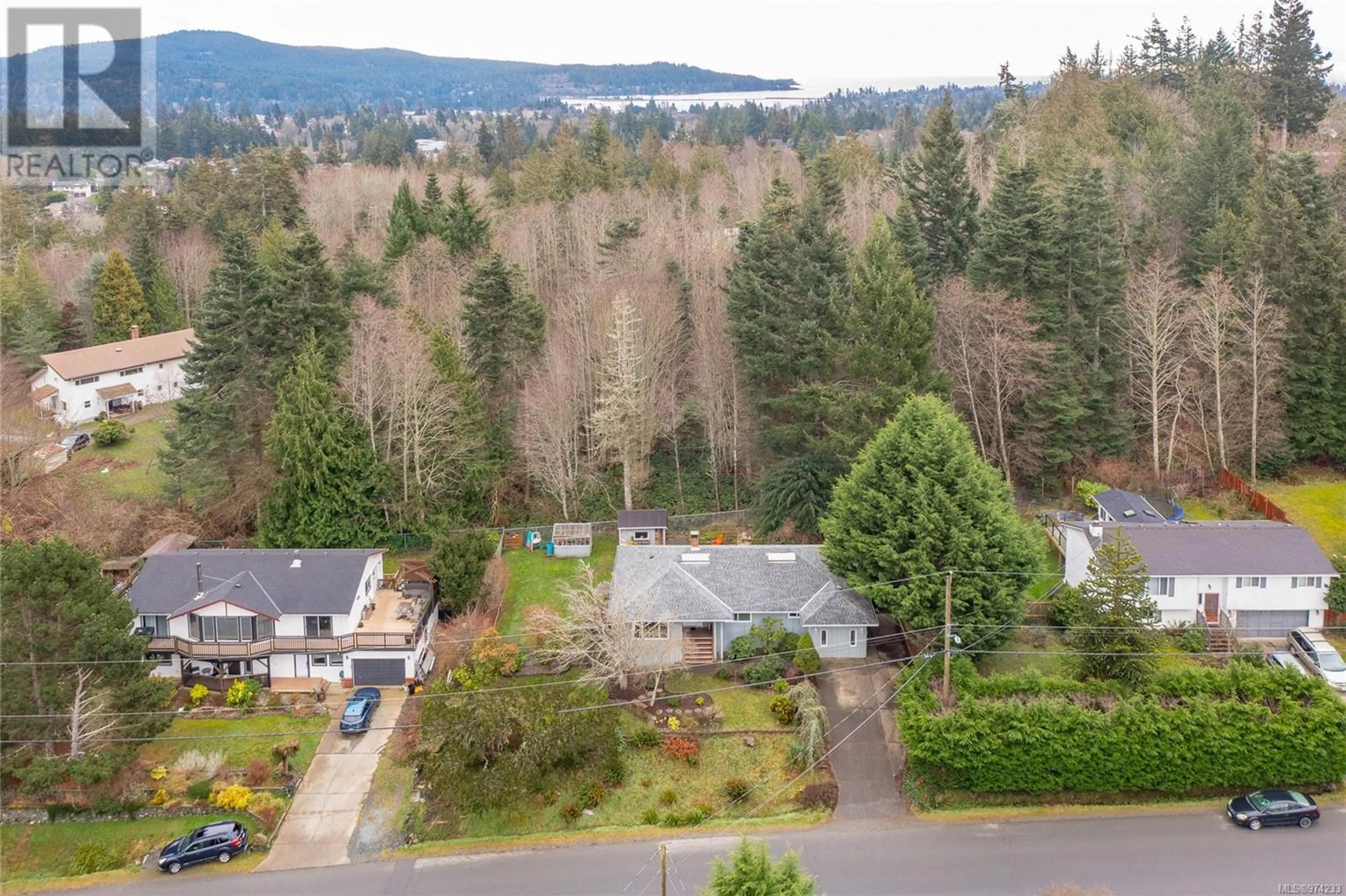 A pic from outside/outdoor area/front of a property/back of a property/a pic from drone, forest/trees view for 6773 Foreman Heights Dr, Sooke British Columbia V9Z0L4