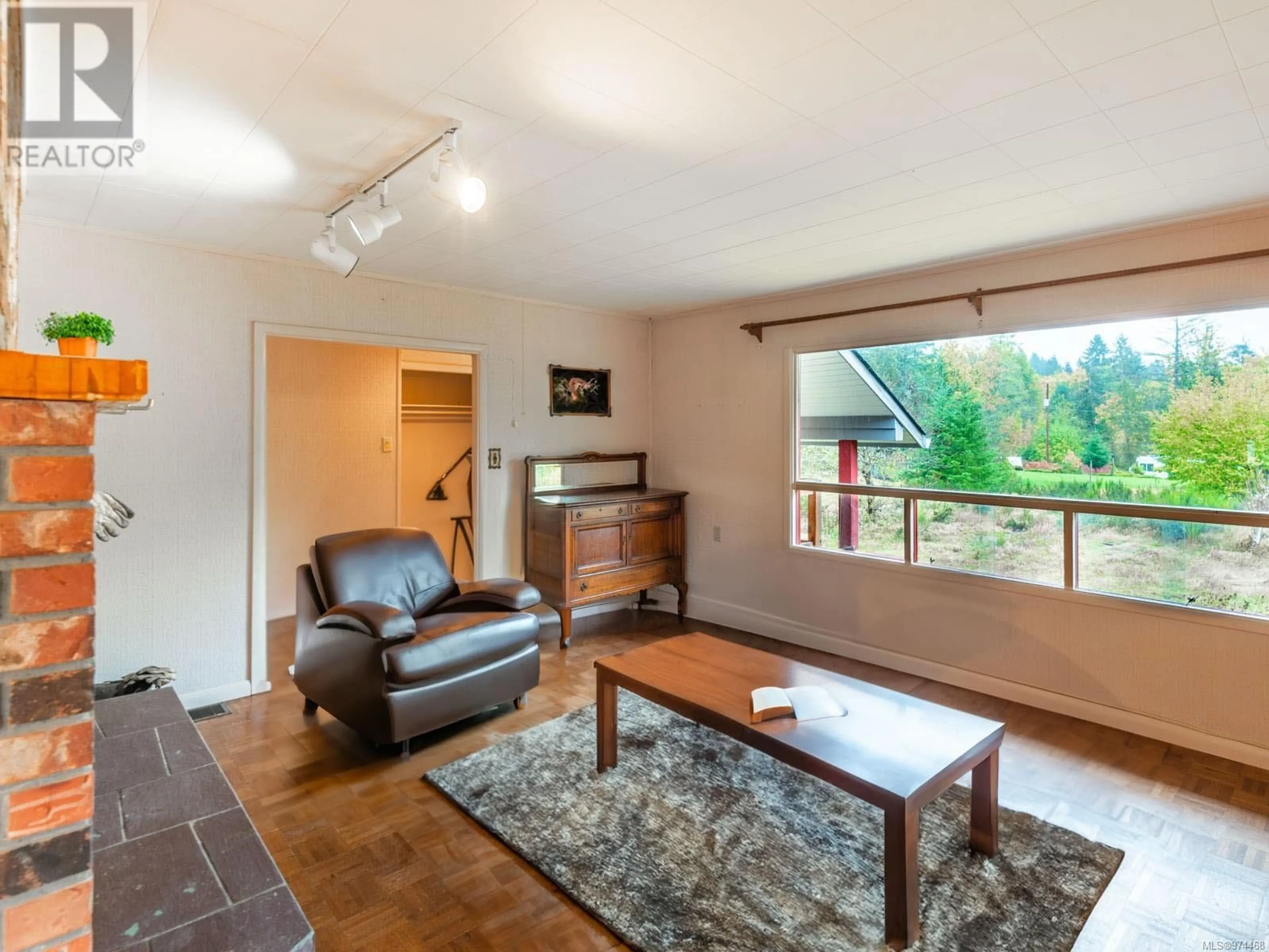 Living room, wood floors for 9450 Central Lake Rd, Port Alberni British Columbia V9Y8Z1