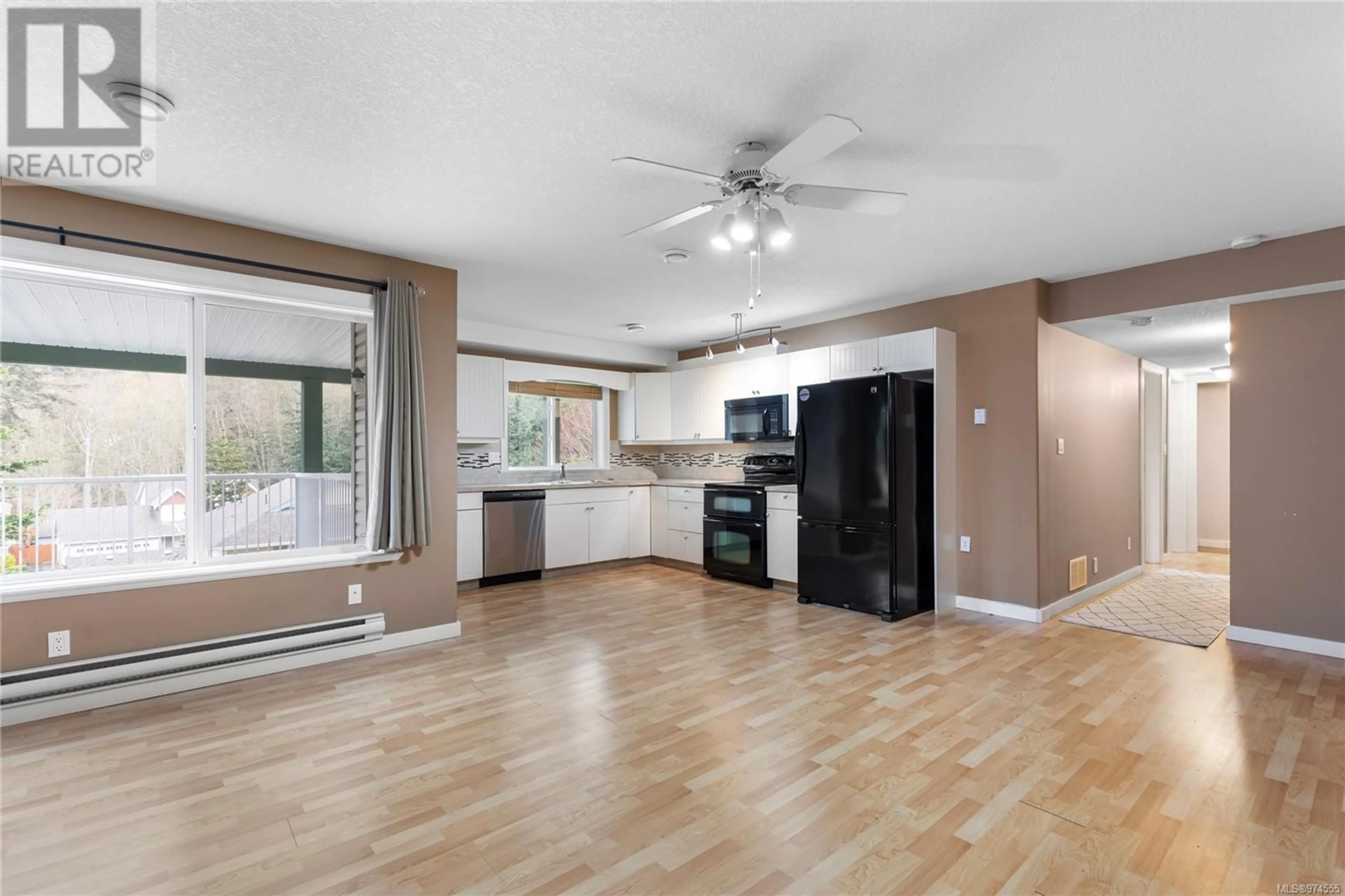 Open concept kitchen for 4957 Ney Dr, Nanaimo British Columbia V9V1T9