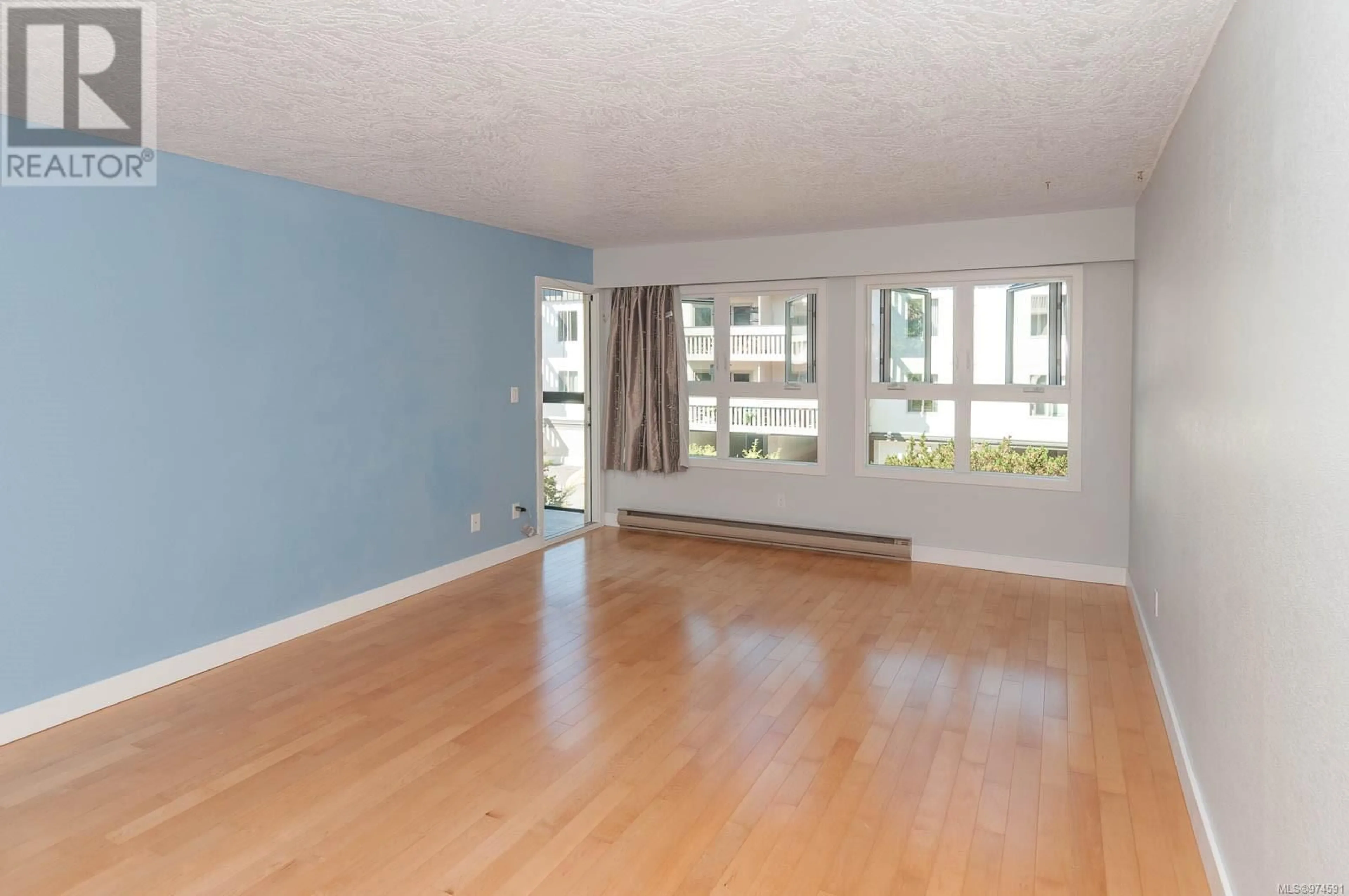 A pic of a room, wood floors for 313 1610 Jubilee Ave, Victoria British Columbia V8R6P3