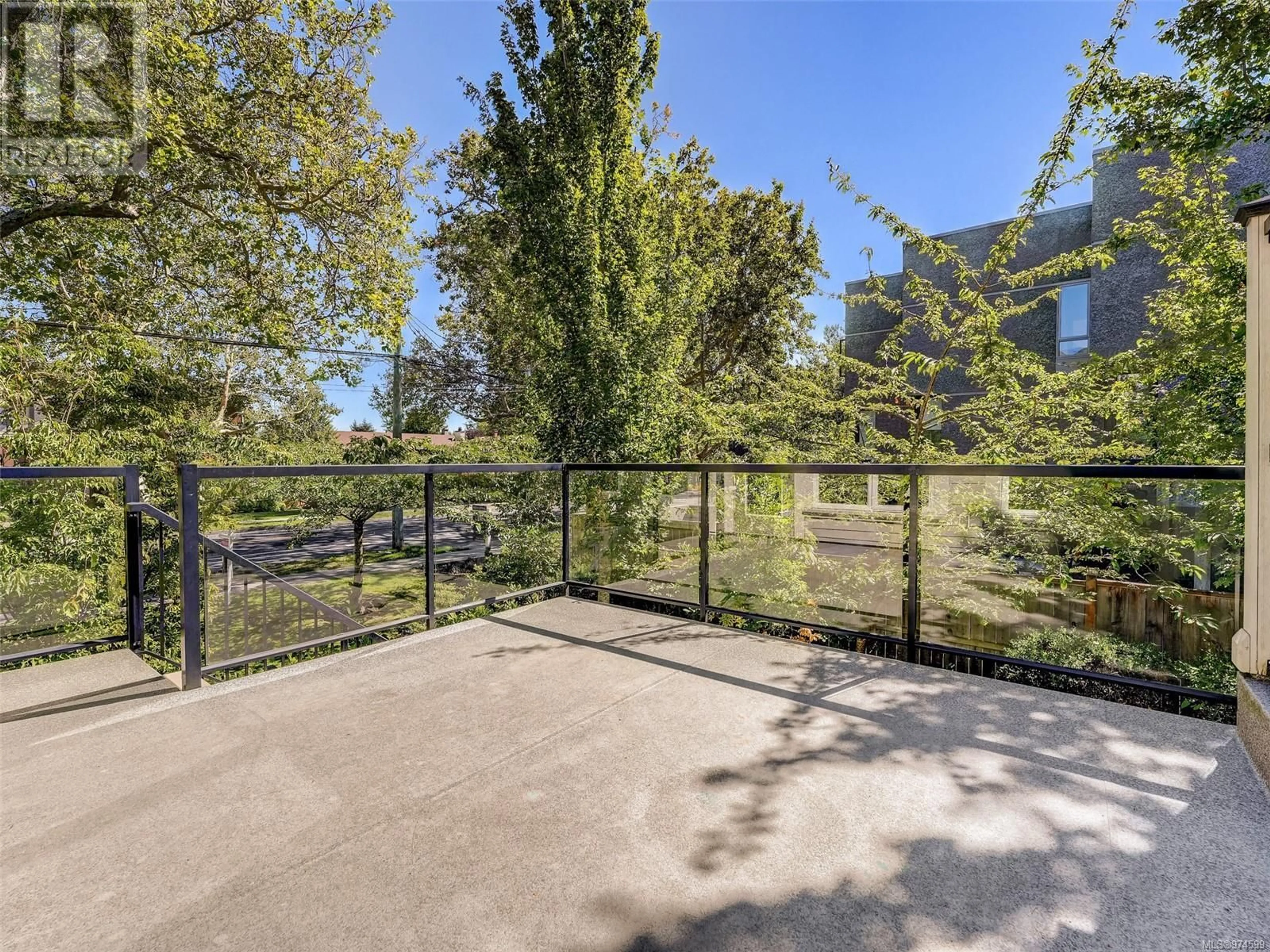 Patio, the fenced backyard for 1 2918 Shelbourne St, Victoria British Columbia V8R4M6