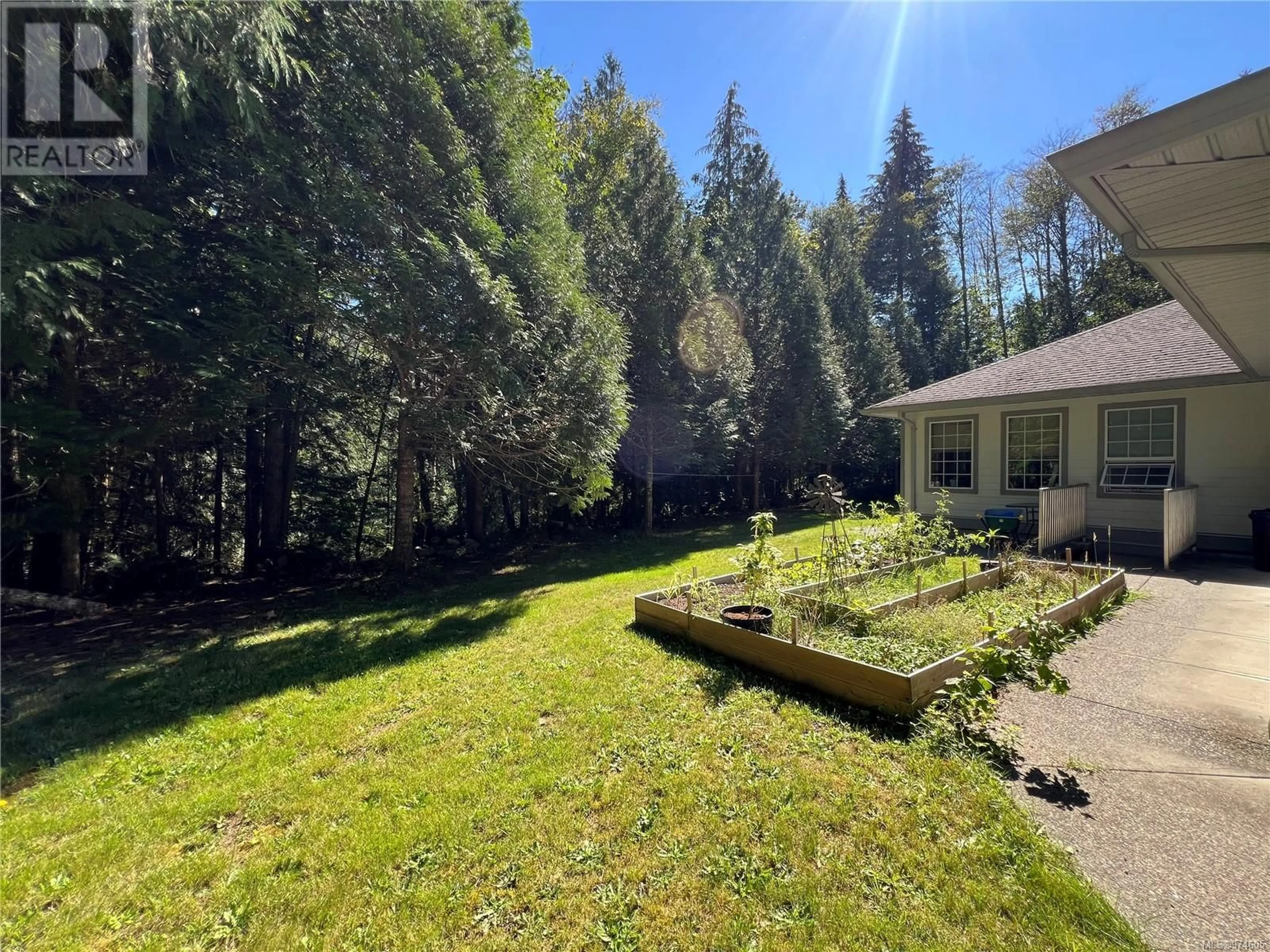 A pic from outside/outdoor area/front of a property/back of a property/a pic from drone, forest/trees view for 493 MAQUINNA CRESCENT, Gold River British Columbia V0P1G0