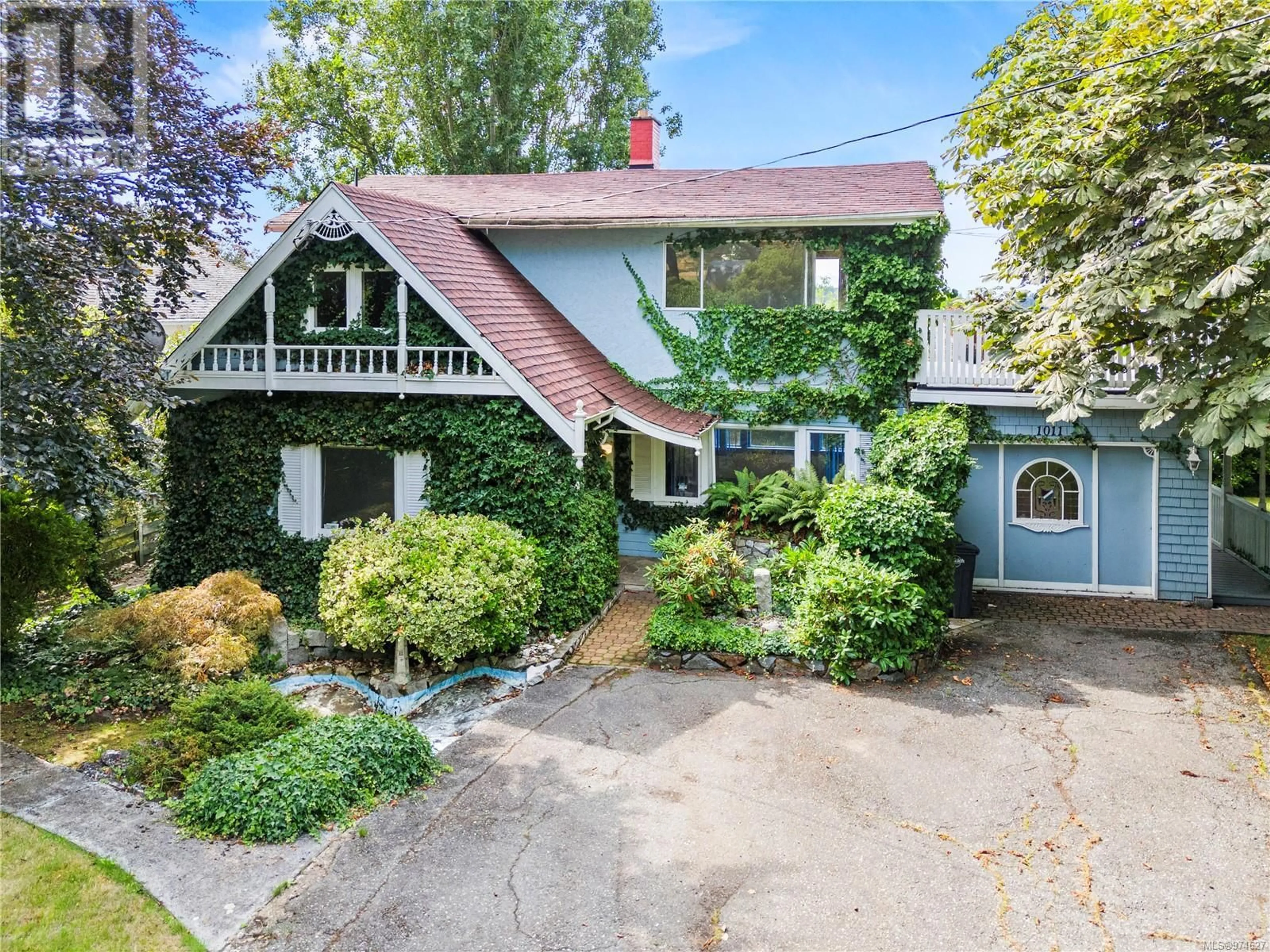 Frontside or backside of a home, cottage for 1011 Burnside Rd W, Saanich British Columbia V8Z1N3