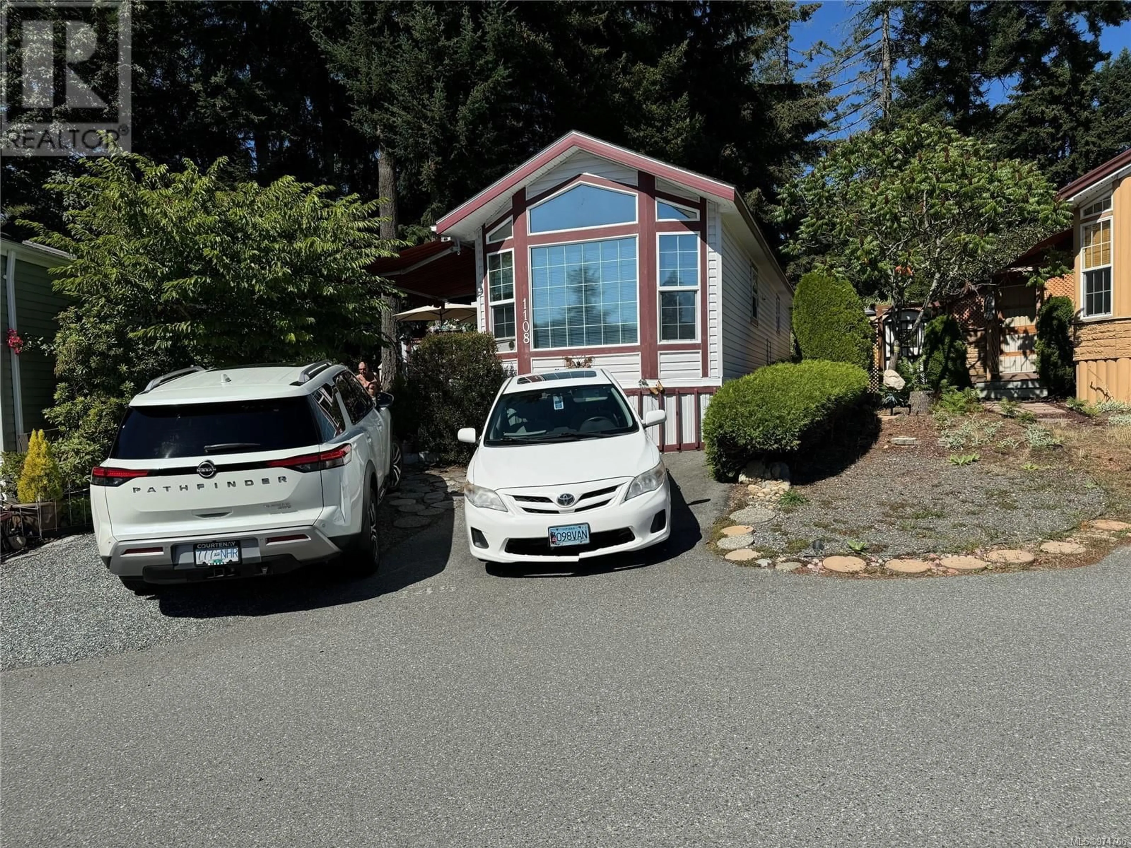 A pic from exterior of the house or condo, the street view for 1108 Woss Lake Dr, Nanaimo British Columbia V9R6X7