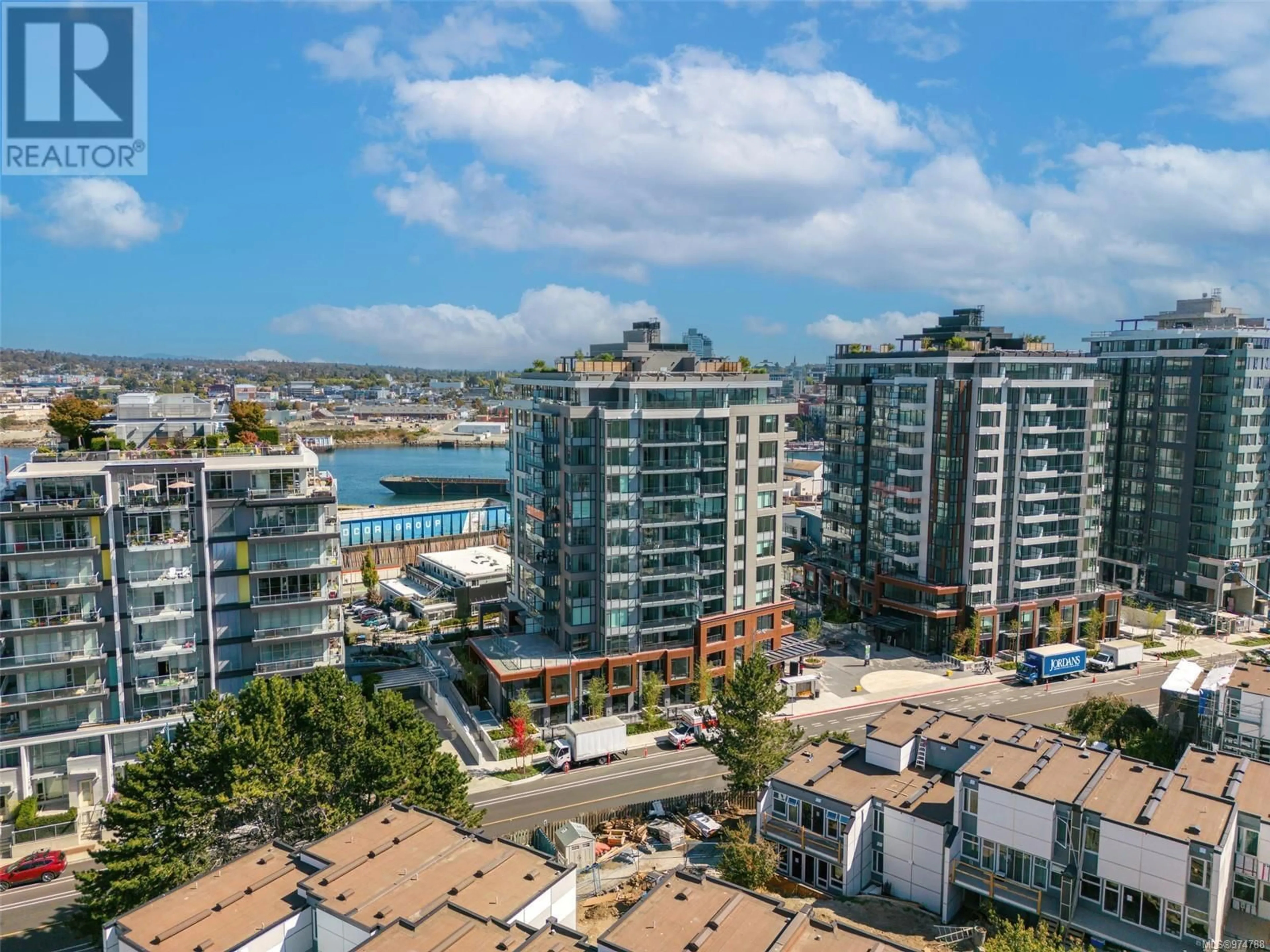 A pic from exterior of the house or condo, the view of city buildings for 1007 369 Tyee Rd, Victoria British Columbia V9A0B6