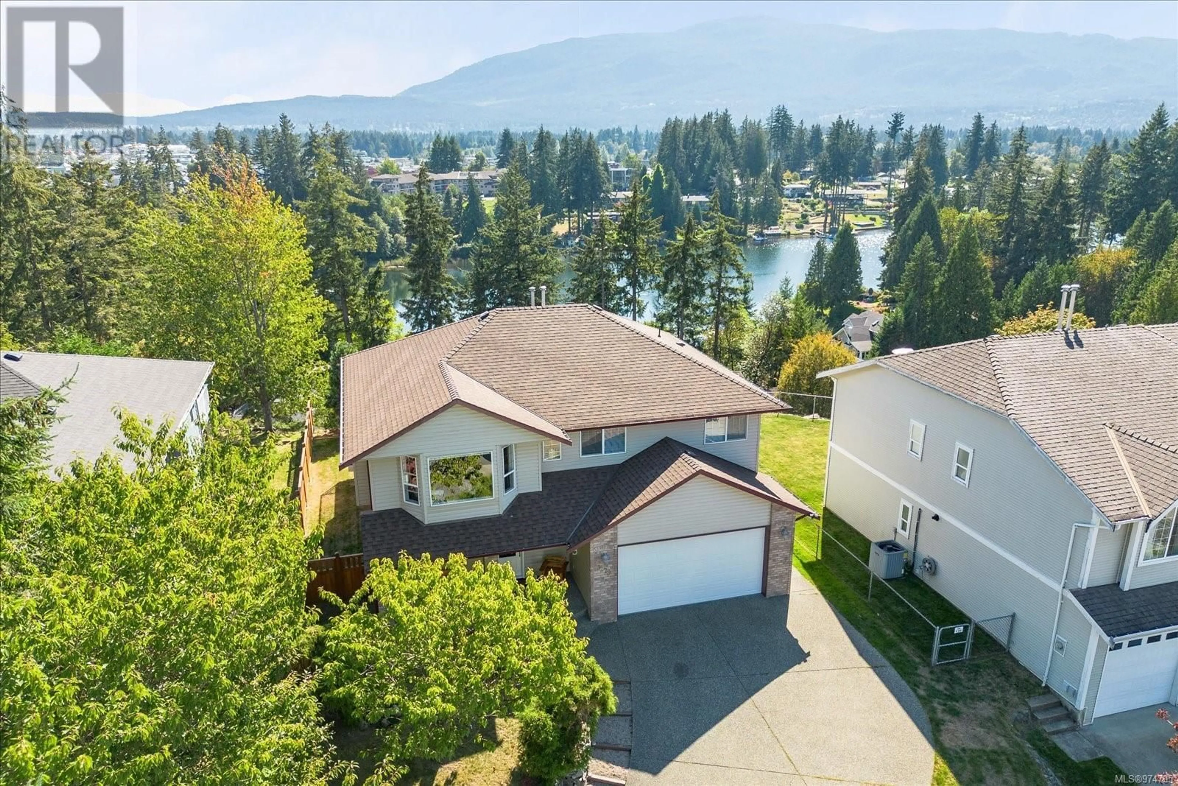 Frontside or backside of a home, lake for 3279 Crystal Pl, Nanaimo British Columbia V9T2S2