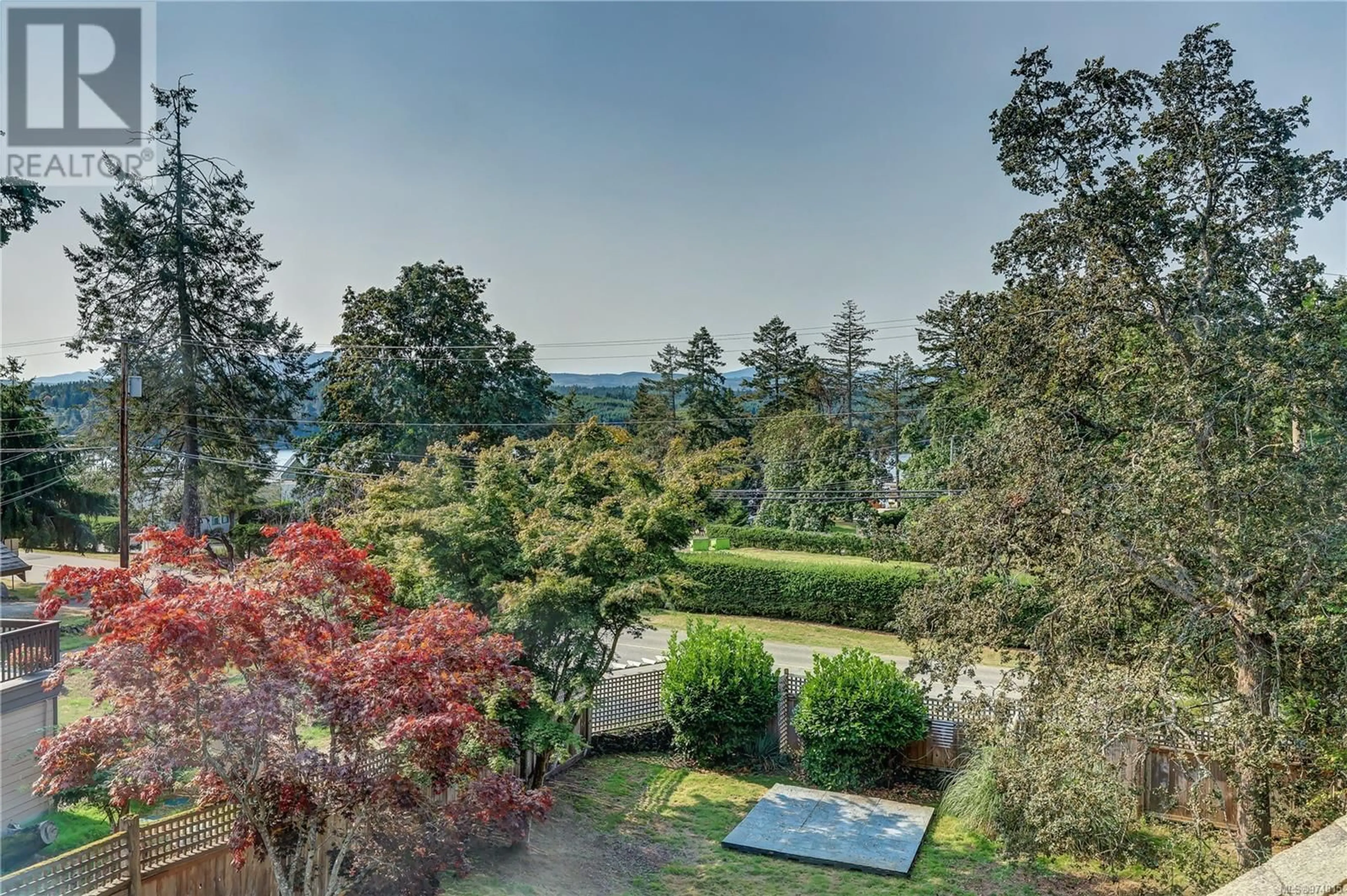 Patio, the fenced backyard for 1546 Marina Way, Nanoose Bay British Columbia V9P9B6