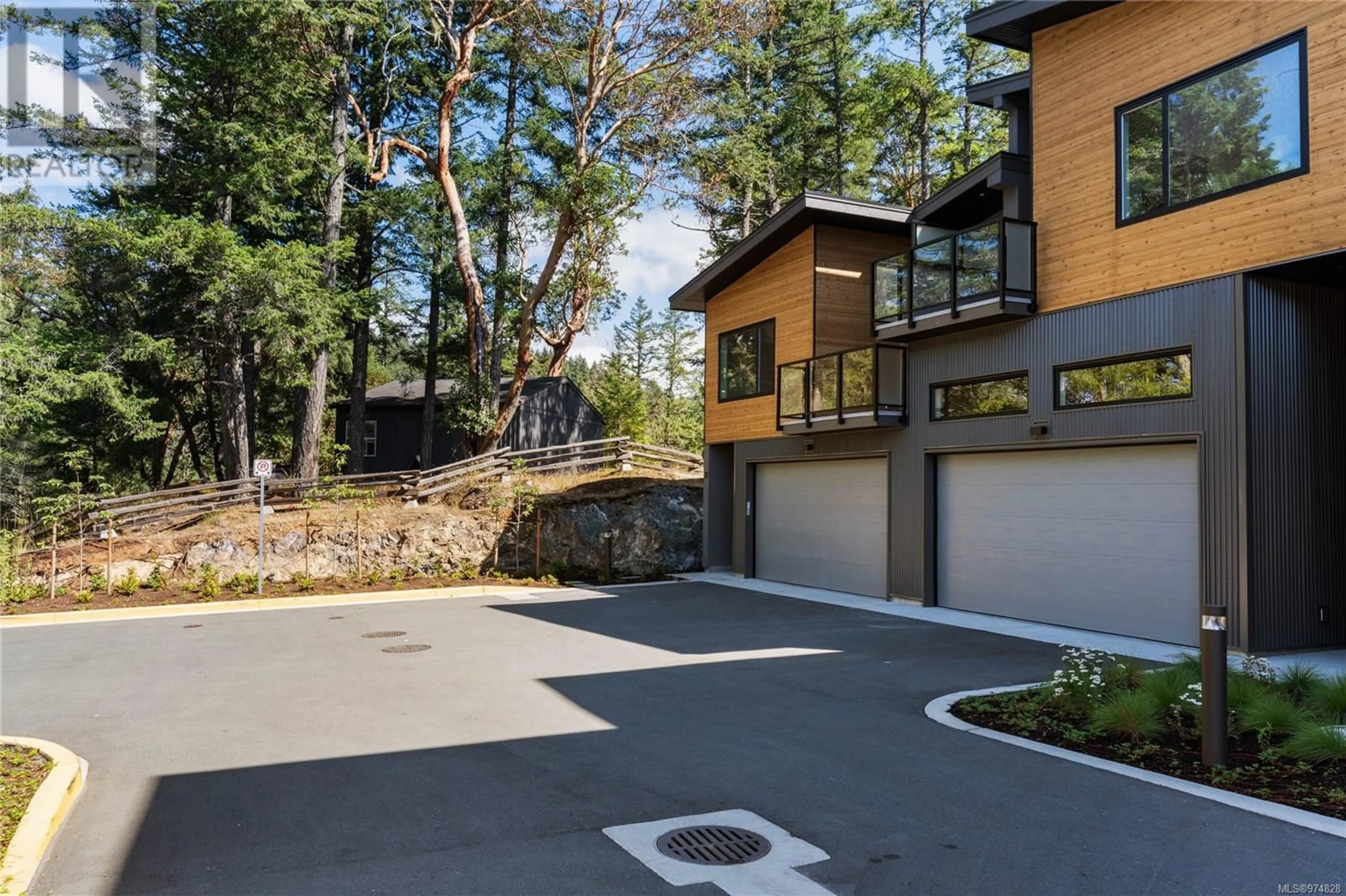 Frontside or backside of a home, the fenced backyard for 18 3921 Olympian Way, Colwood British Columbia V9C0T1