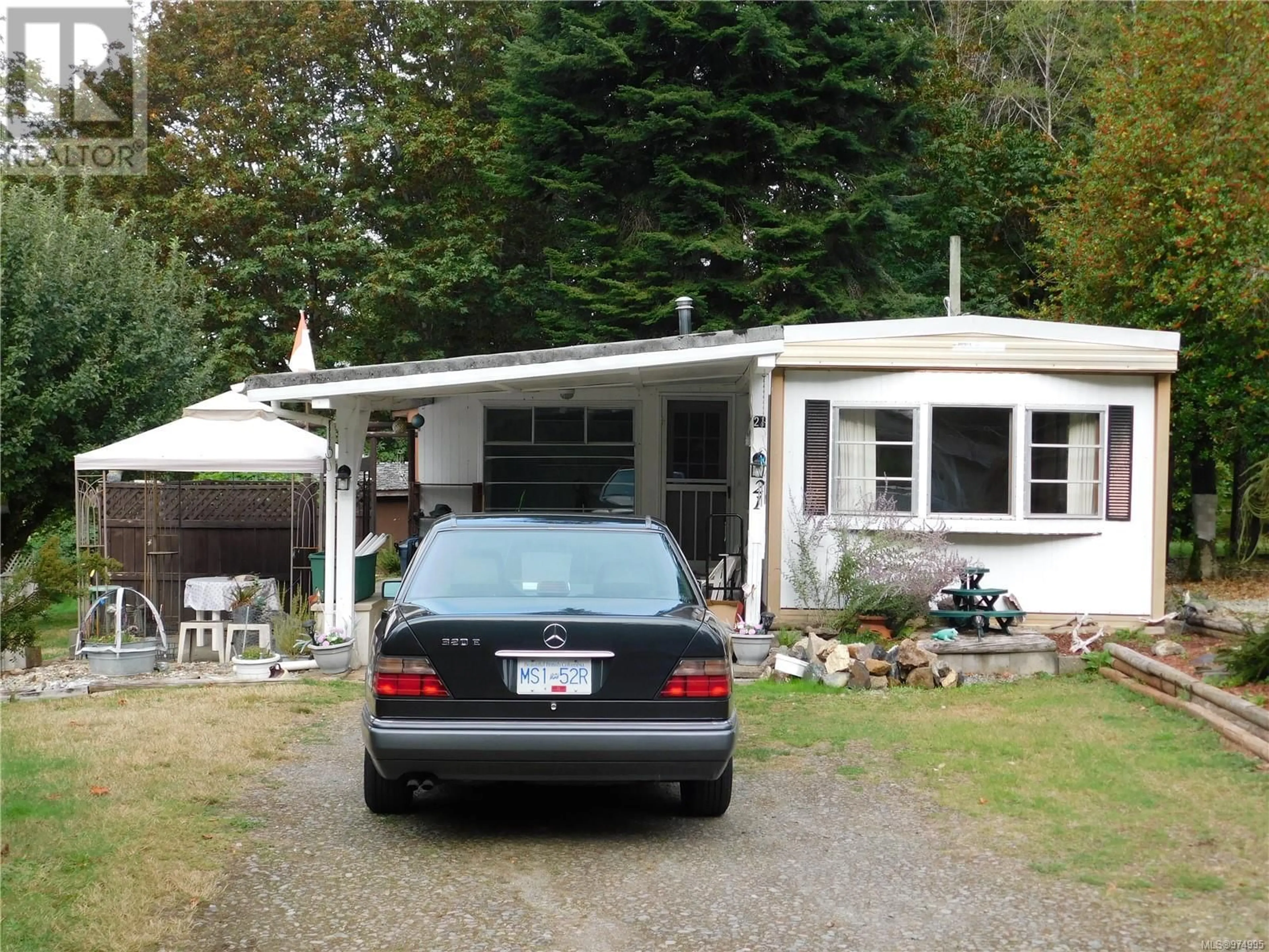 Home with vinyl exterior material for 21 5679 Tomswood Rd, Port Alberni British Columbia V9Y7L6