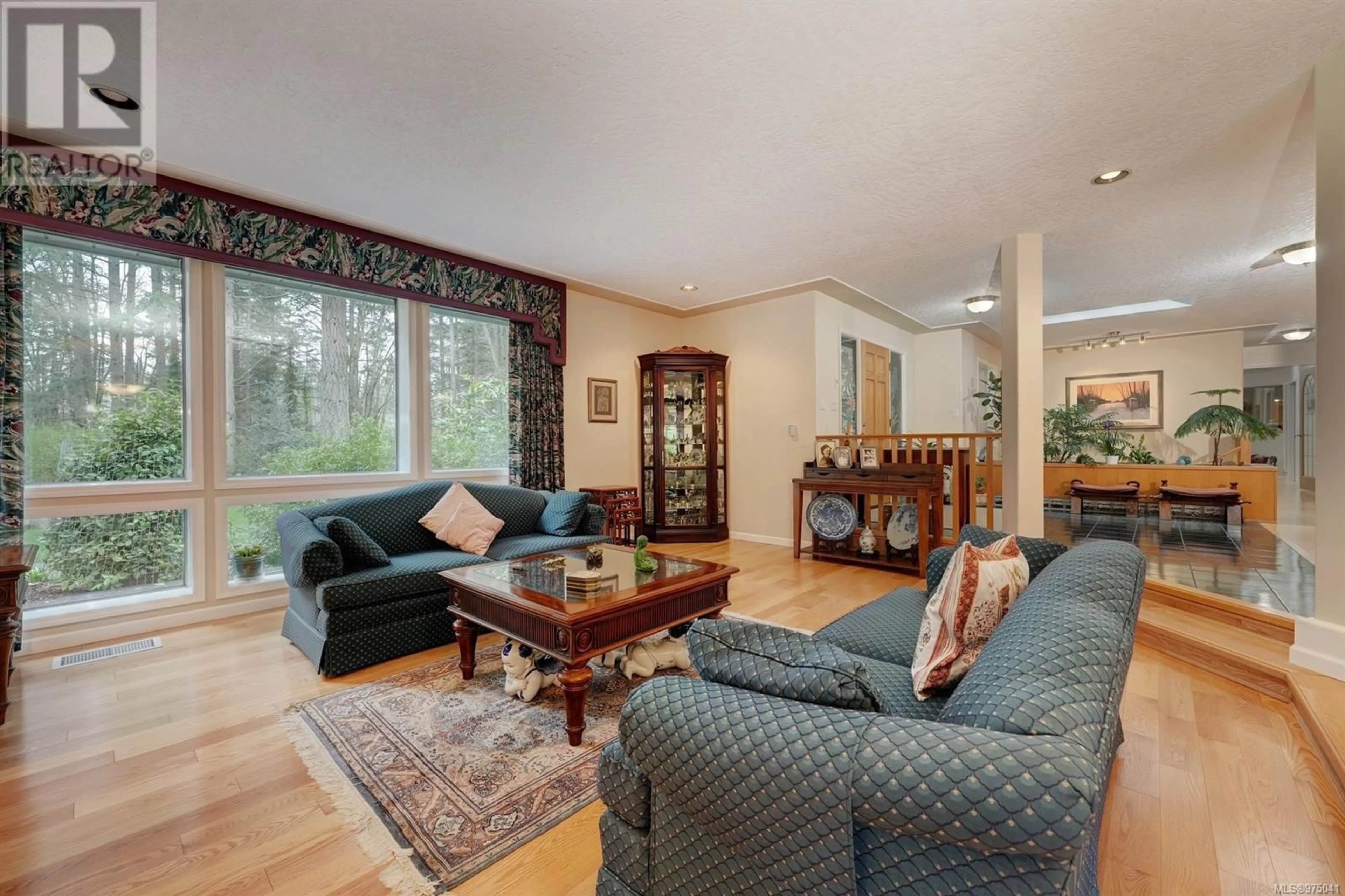 Living room, wood floors for 6363 Old West Saanich Rd, Central Saanich British Columbia V8M1W8