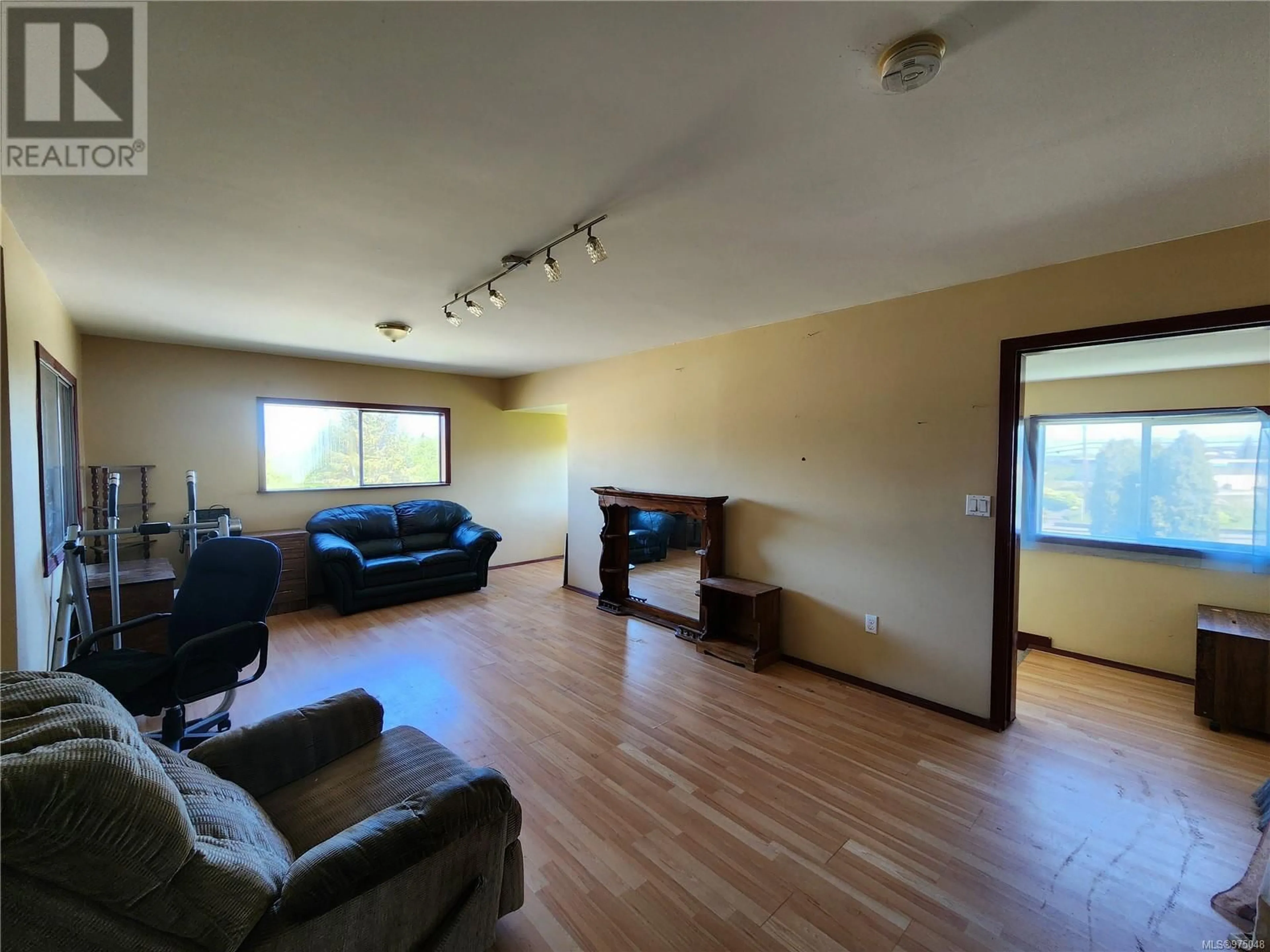 A pic of a room, wood floors for 2293 PIONEER HILL Dr, Port McNeill British Columbia V0N2R0