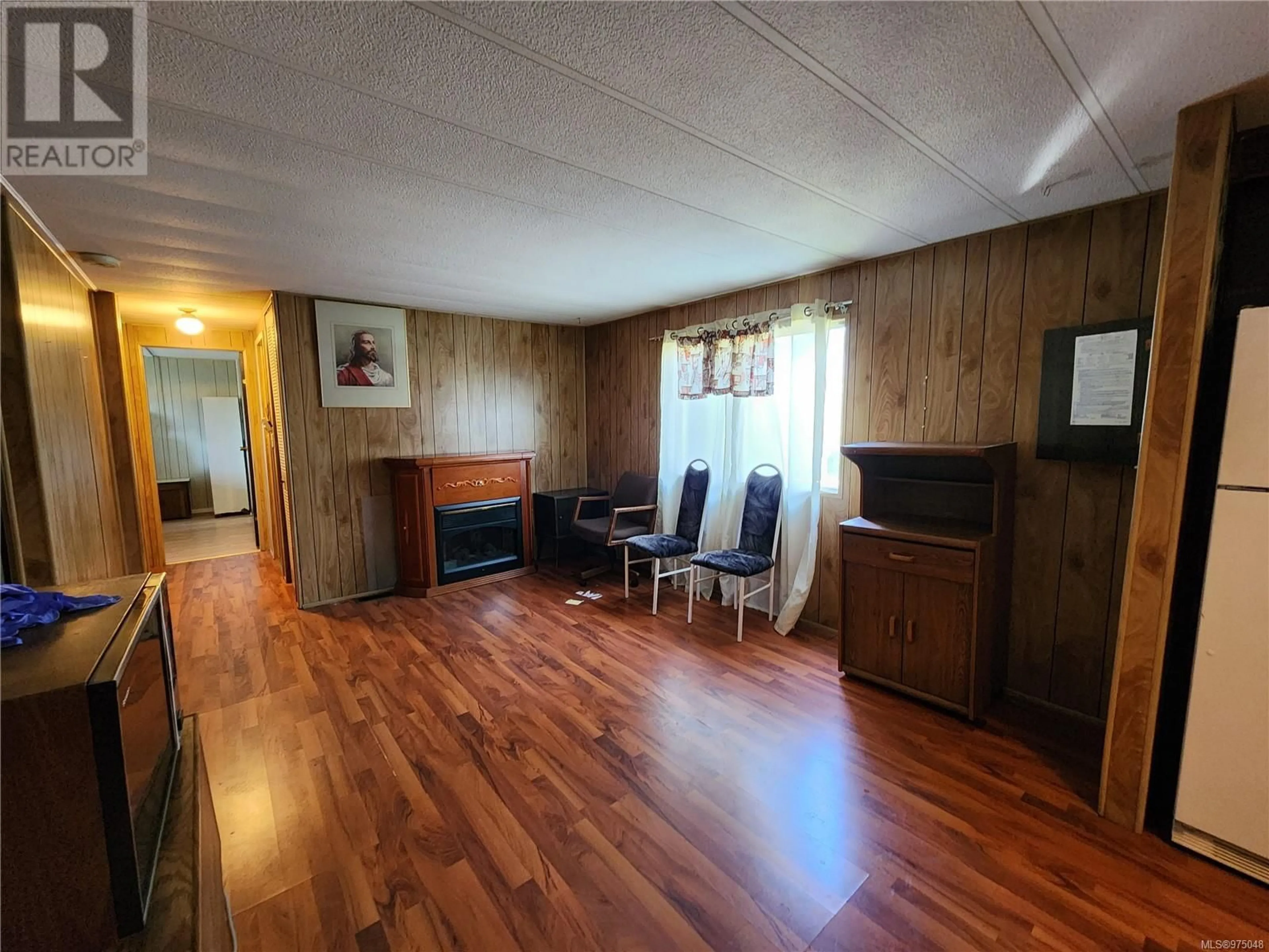 A pic of a room, wood floors for 2293 PIONEER HILL Dr, Port McNeill British Columbia V0N2R0