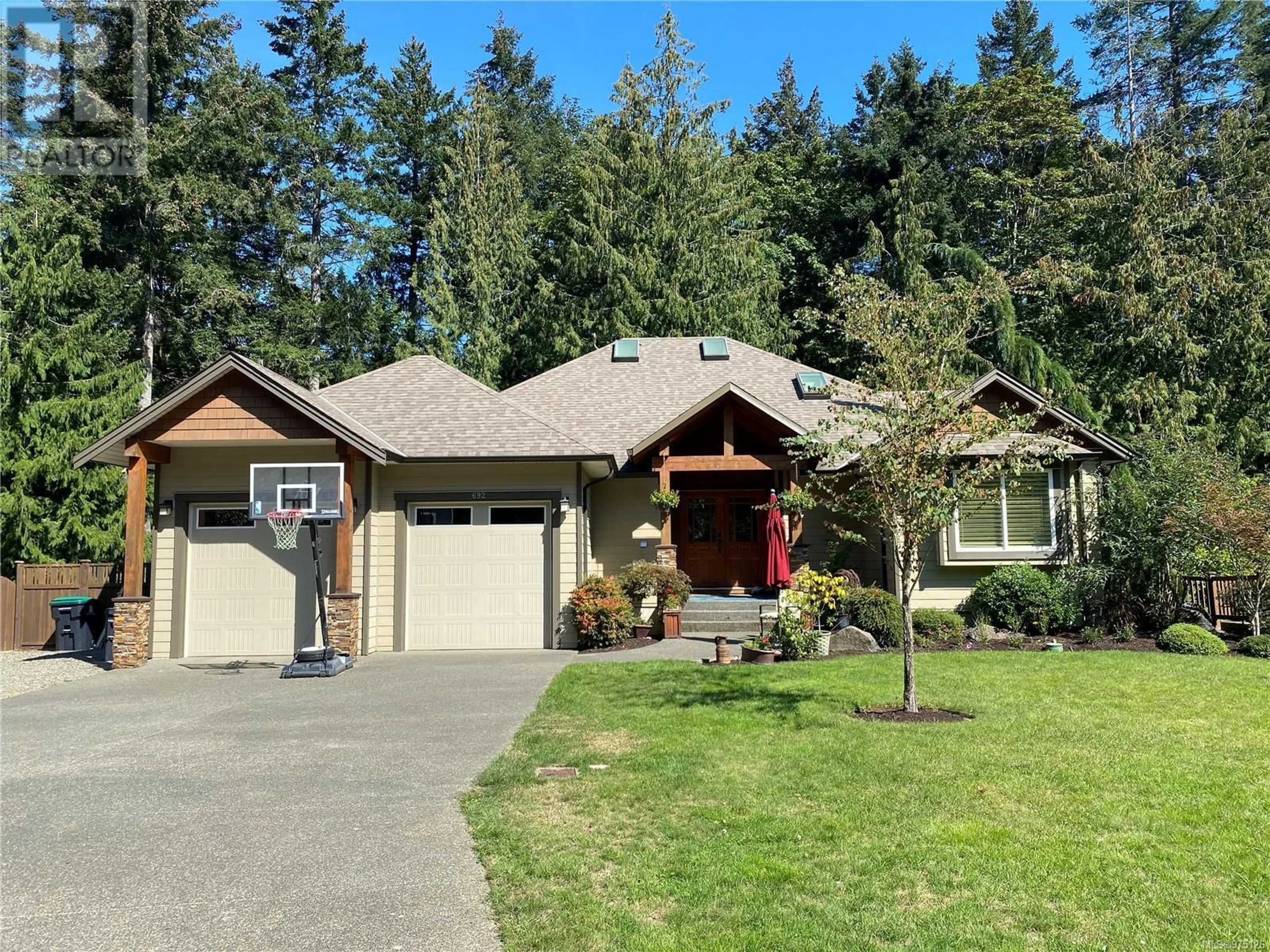 Frontside or backside of a home, cottage for 692 Colby Rd, Comox British Columbia V9M4H8