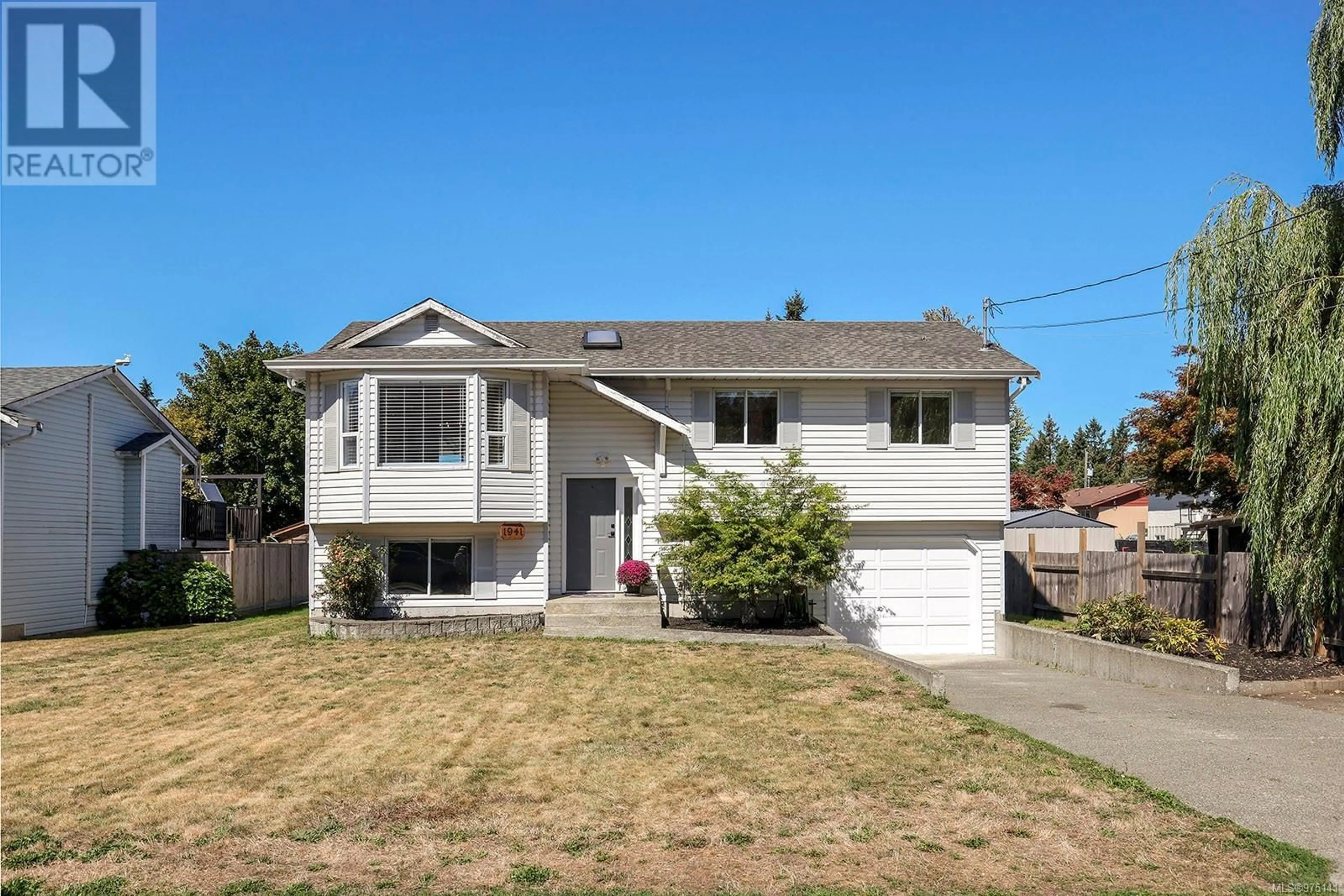 Frontside or backside of a home, the street view for 1941 Embleton Cres, Courtenay British Columbia V9N8K1