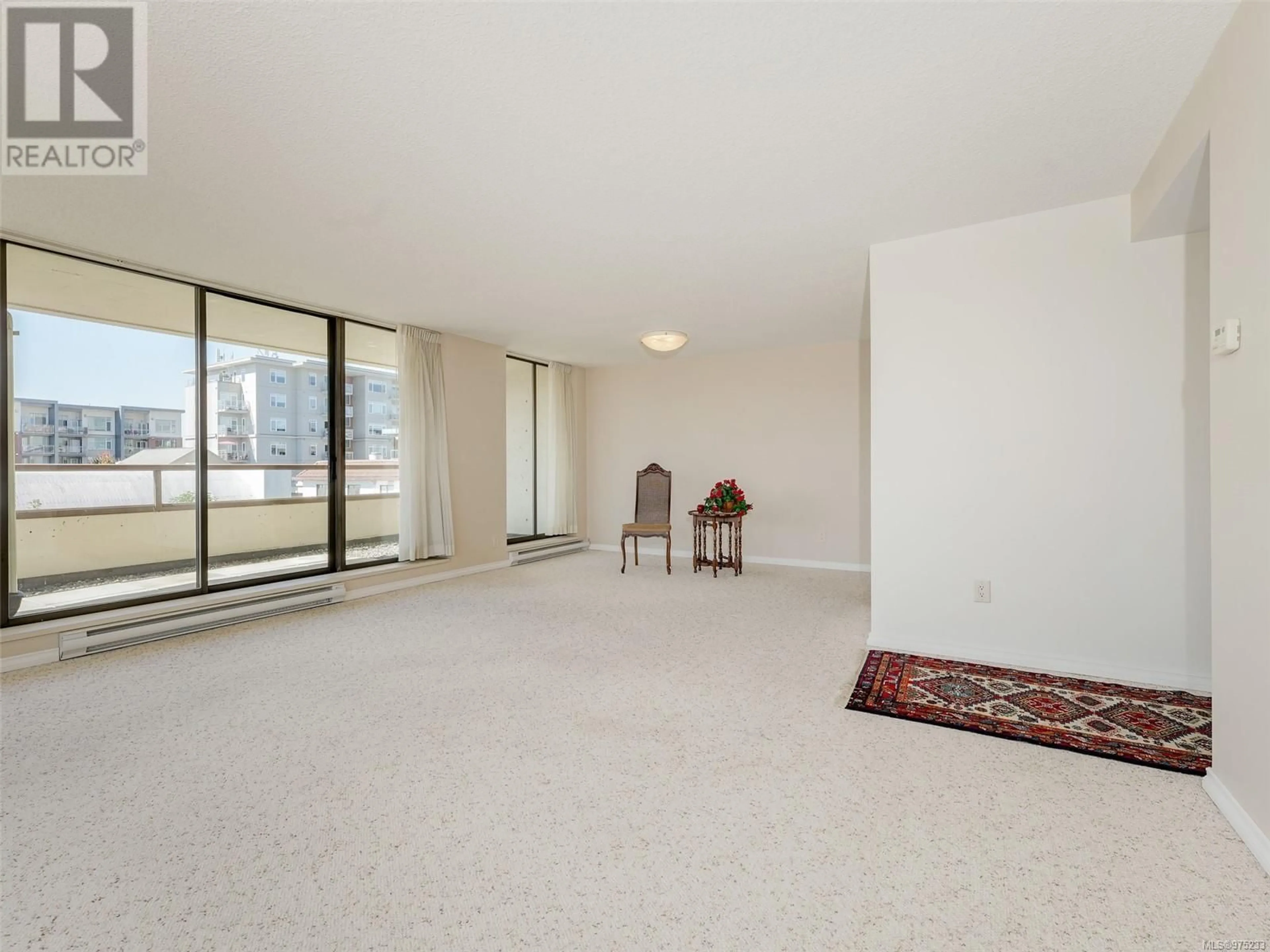 A pic of a room, carpet floors for 204 9805 Second St, Sidney British Columbia V8L4T9