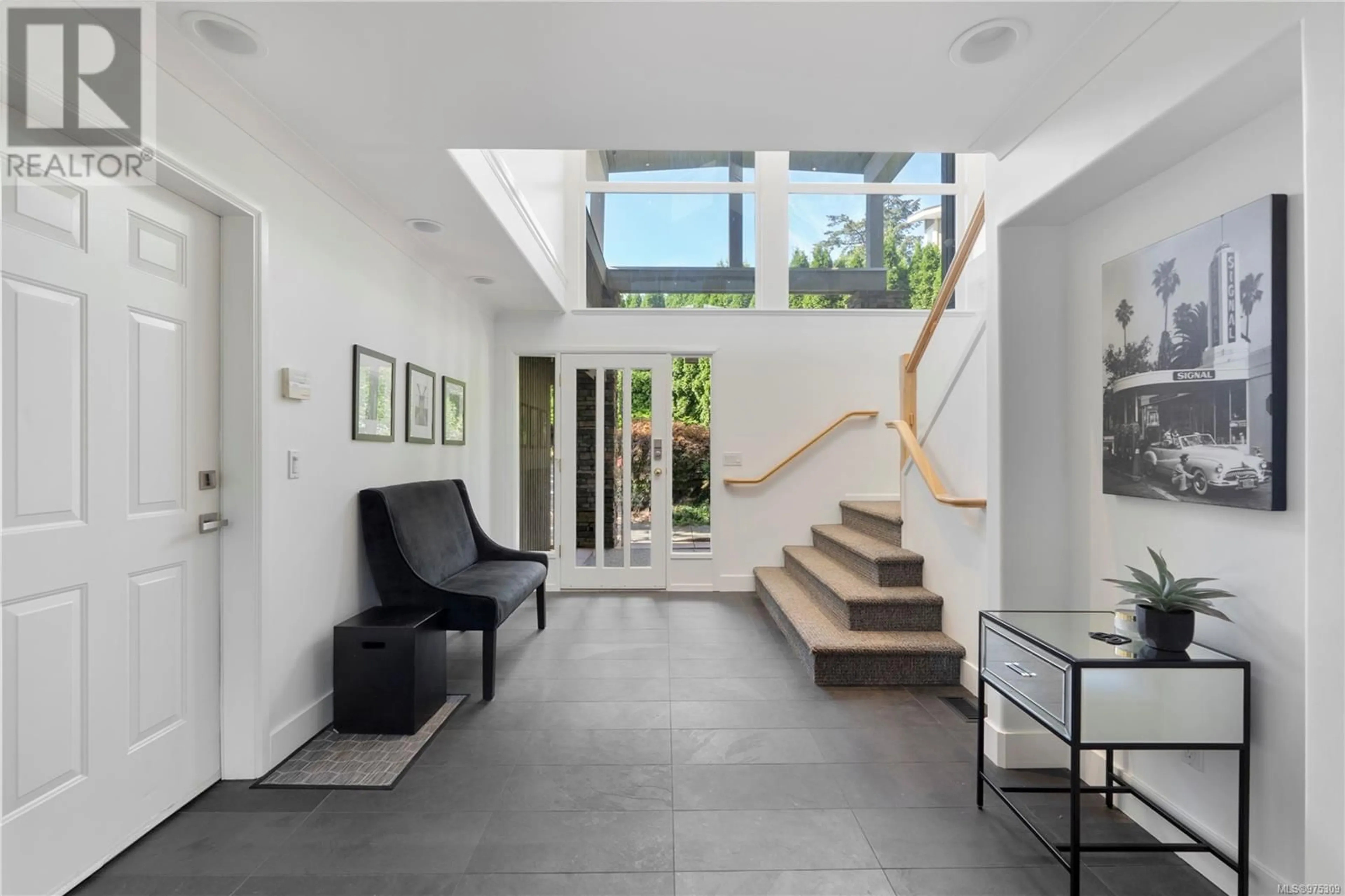 Indoor foyer, ceramic floors for 4394 Wildflower Lane, Saanich British Columbia V8X5H1