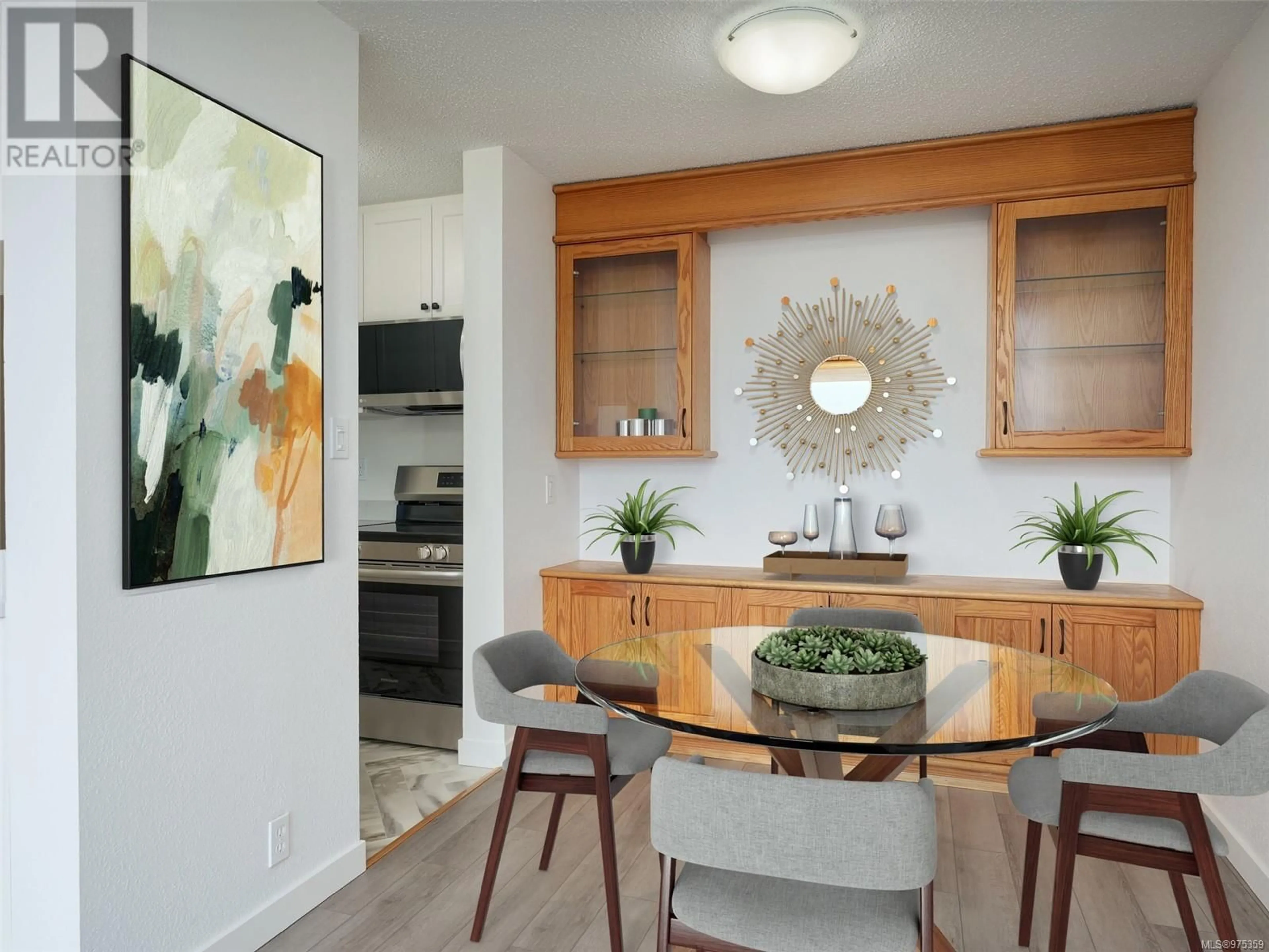 Dining room, wood floors for 401 1630 Quadra St, Victoria British Columbia V8W3J5