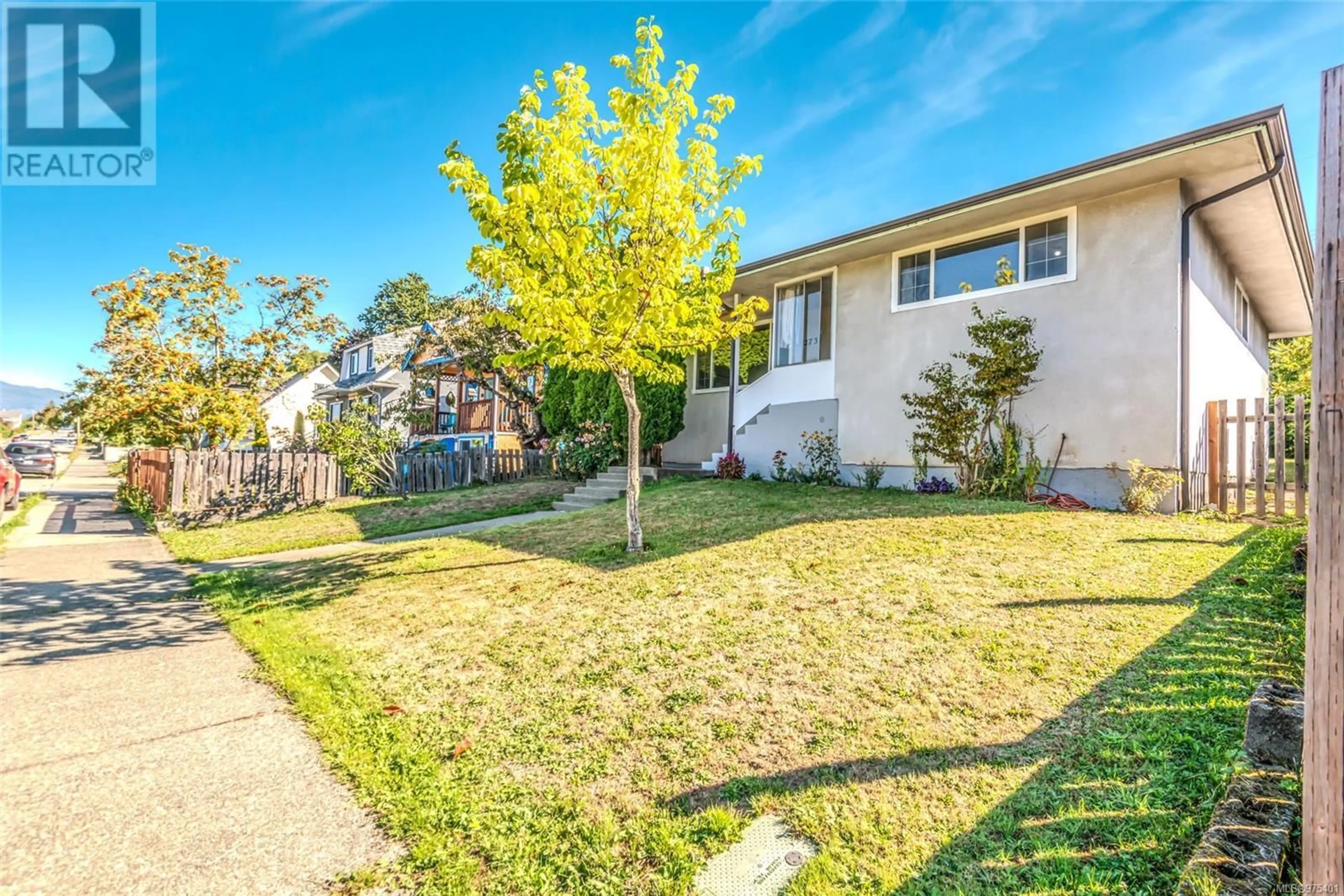 Frontside or backside of a home, the fenced backyard for 2731 6th Ave, Port Alberni British Columbia V9Y2H5