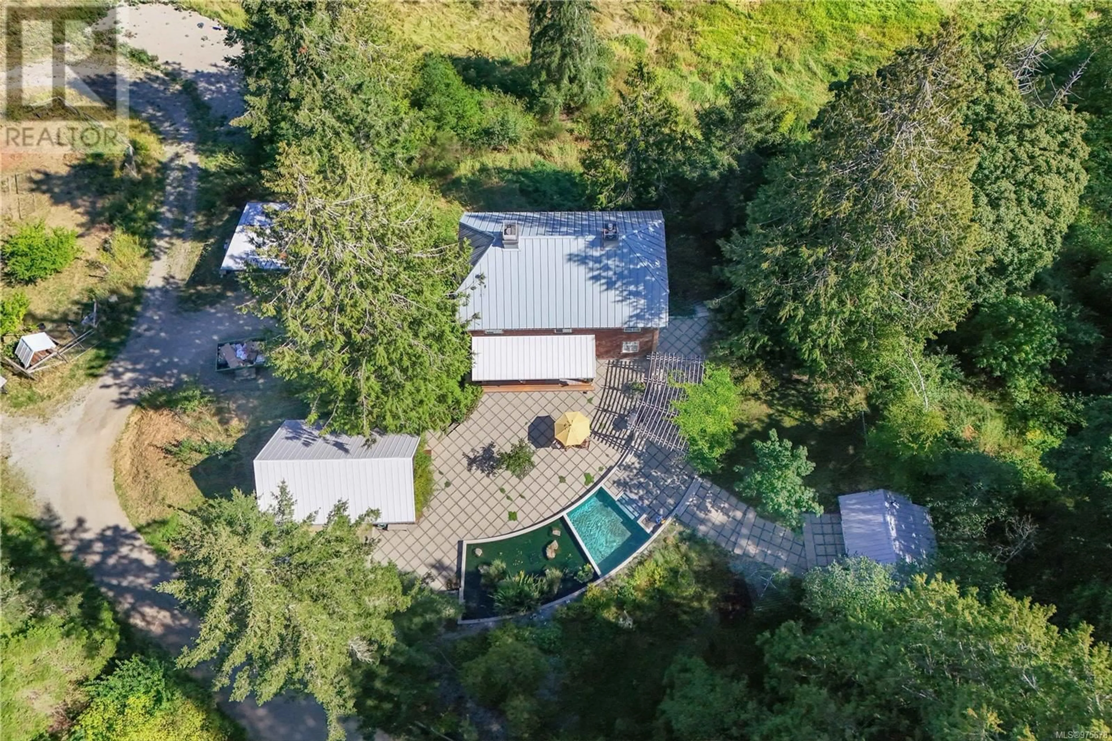 A pic from outside/outdoor area/front of a property/back of a property/a pic from drone, forest/trees view for 121 PEREGRINE WAY, Salt Spring British Columbia V8K2M1