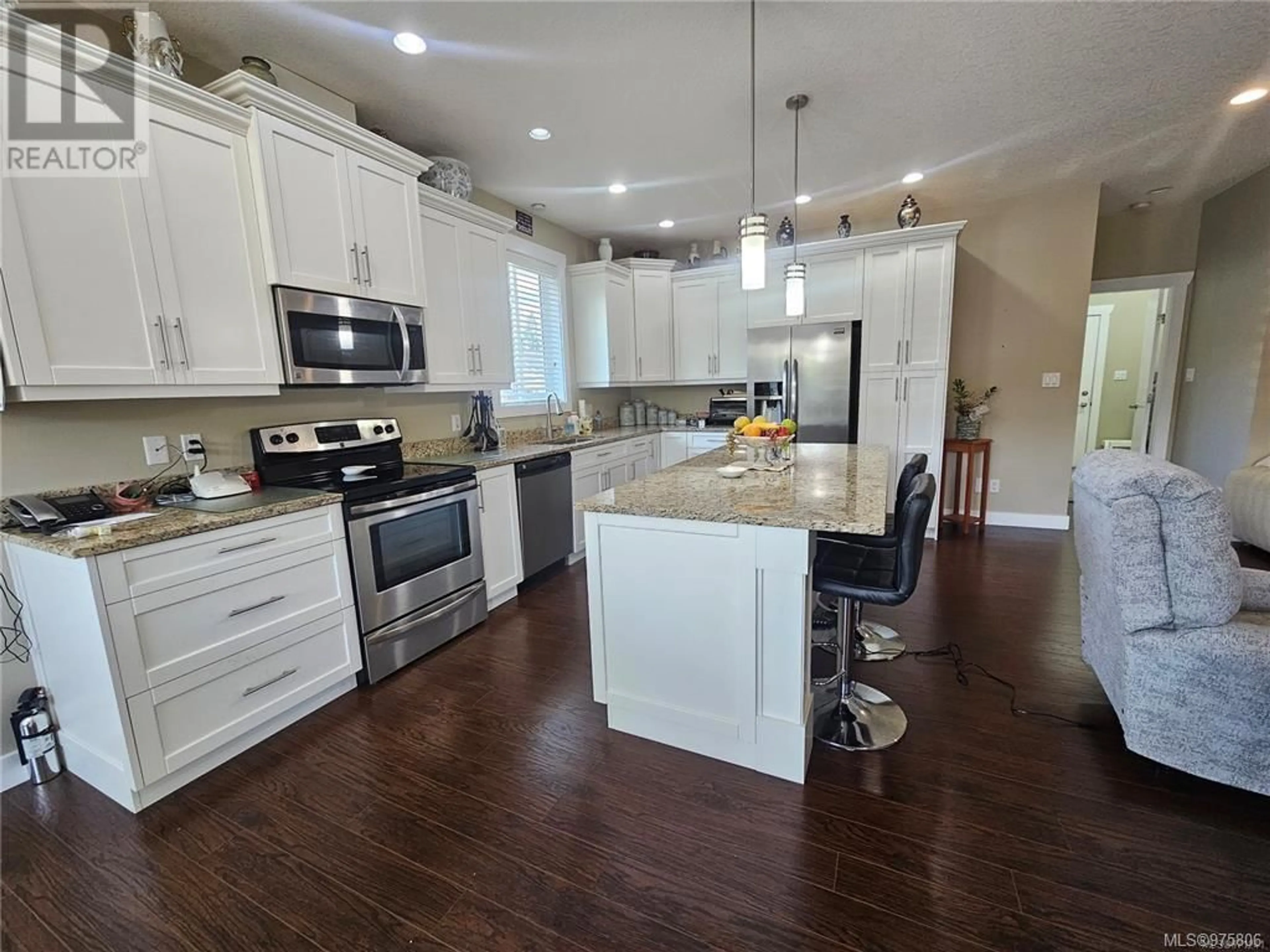 Open concept kitchen for 3627 Lyall Point Cres, Port Alberni British Columbia V9Y0A2