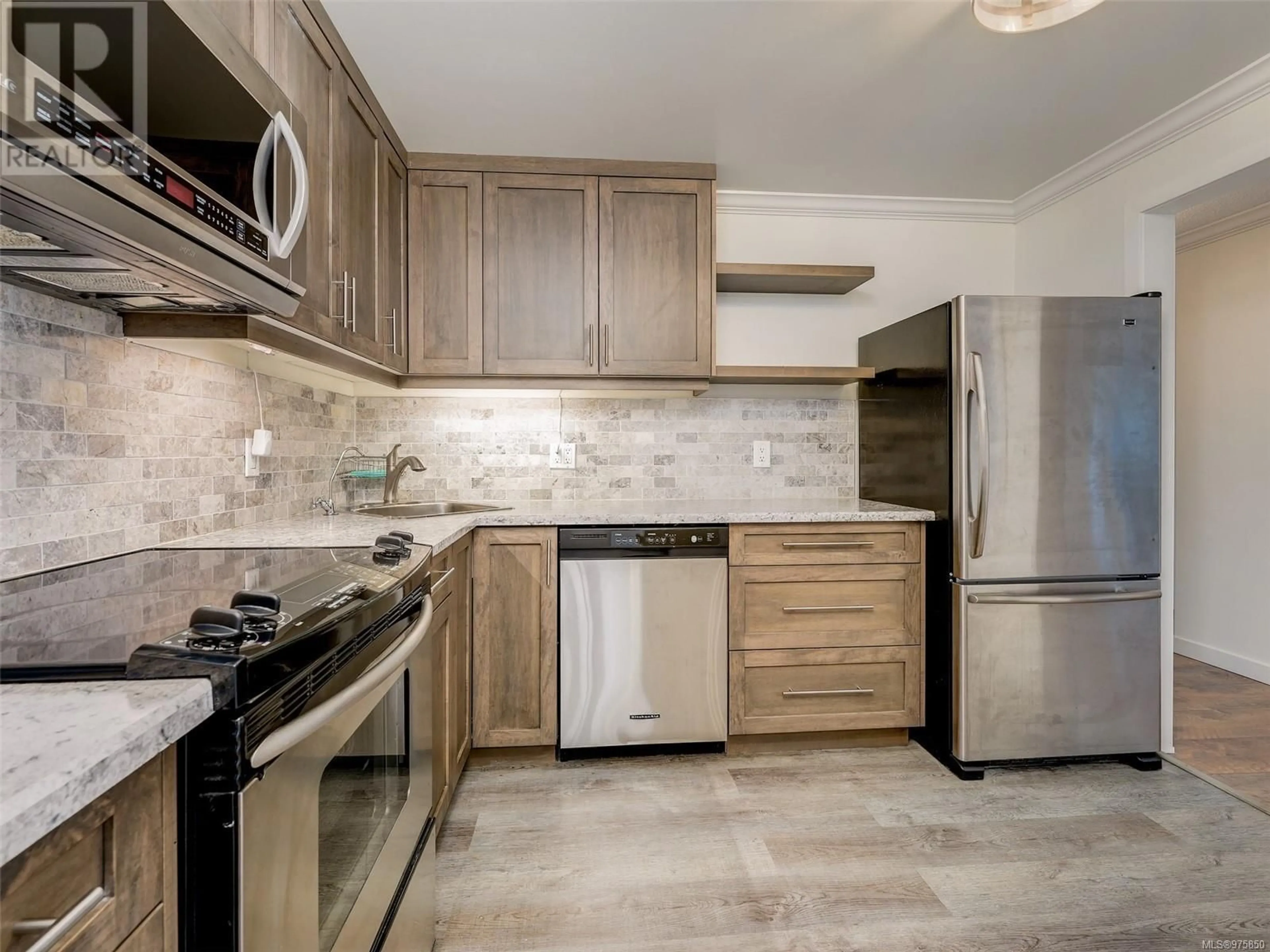 Standard kitchen, ceramic floors for 212 1560 Hillside Ave, Victoria British Columbia V8T5B8