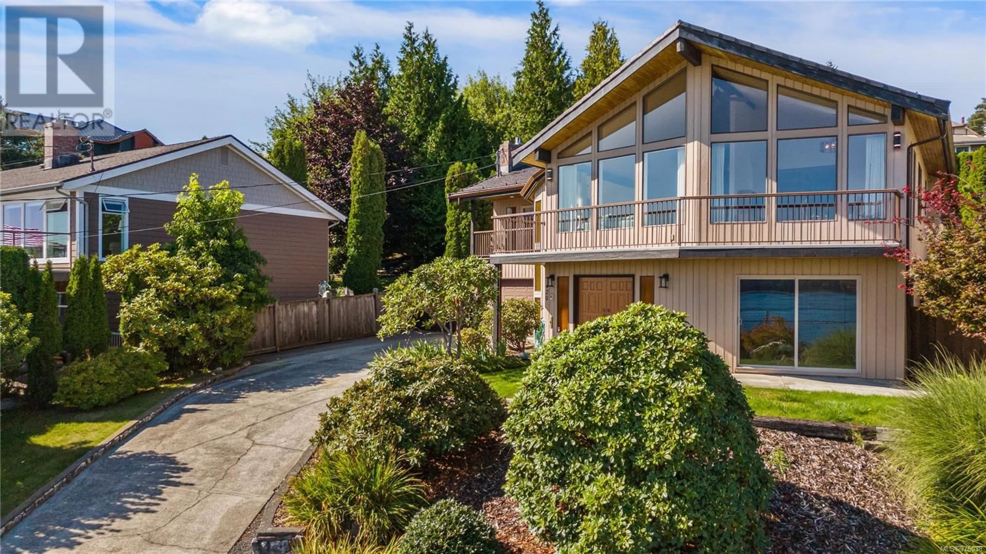 Frontside or backside of a home, the fenced backyard for 420 Carnegie St, Campbell River British Columbia V9W6N7