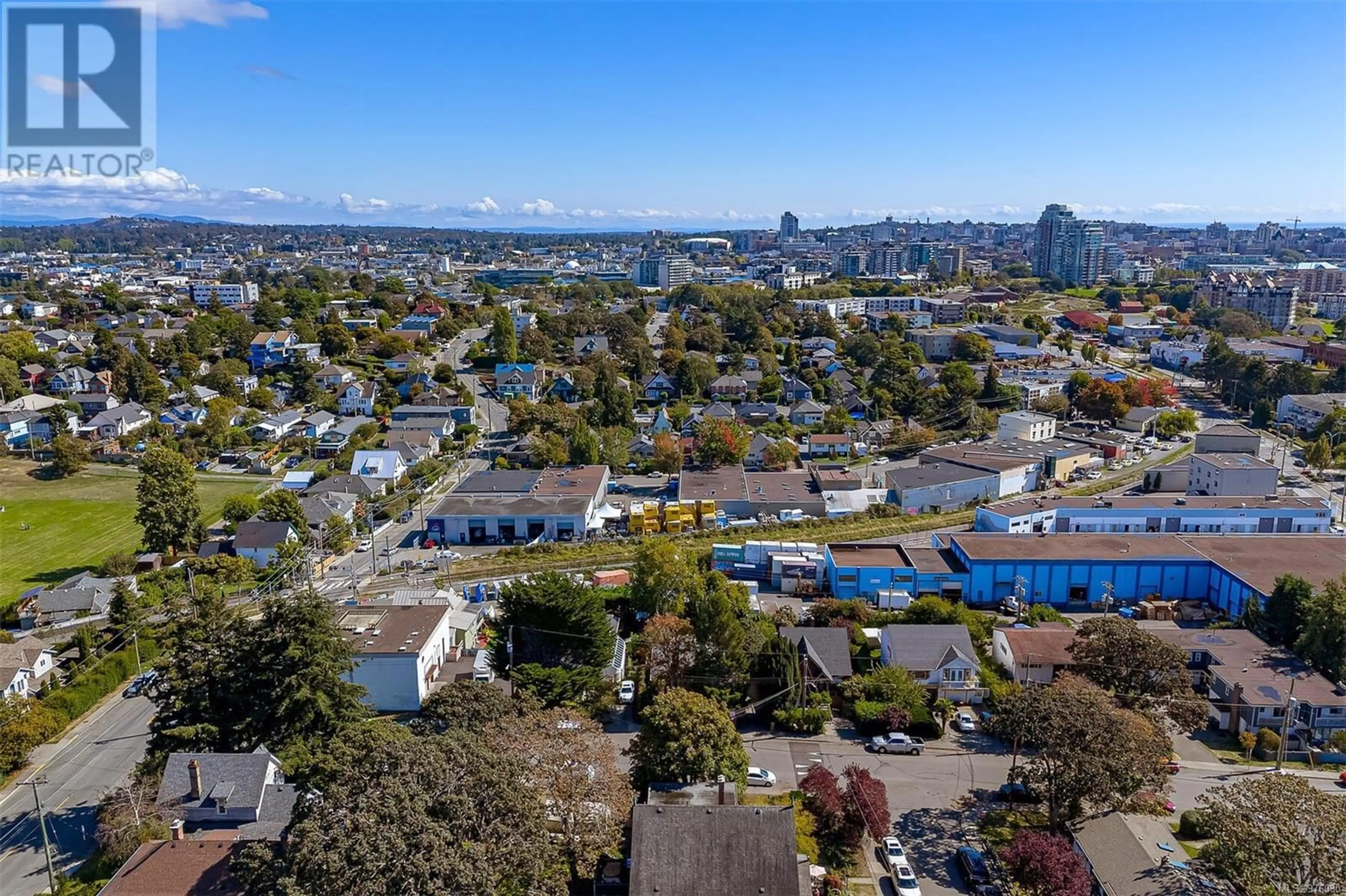 A pic from exterior of the house or condo, the fenced backyard for 545 Dalton St, Victoria British Columbia V9A4B1