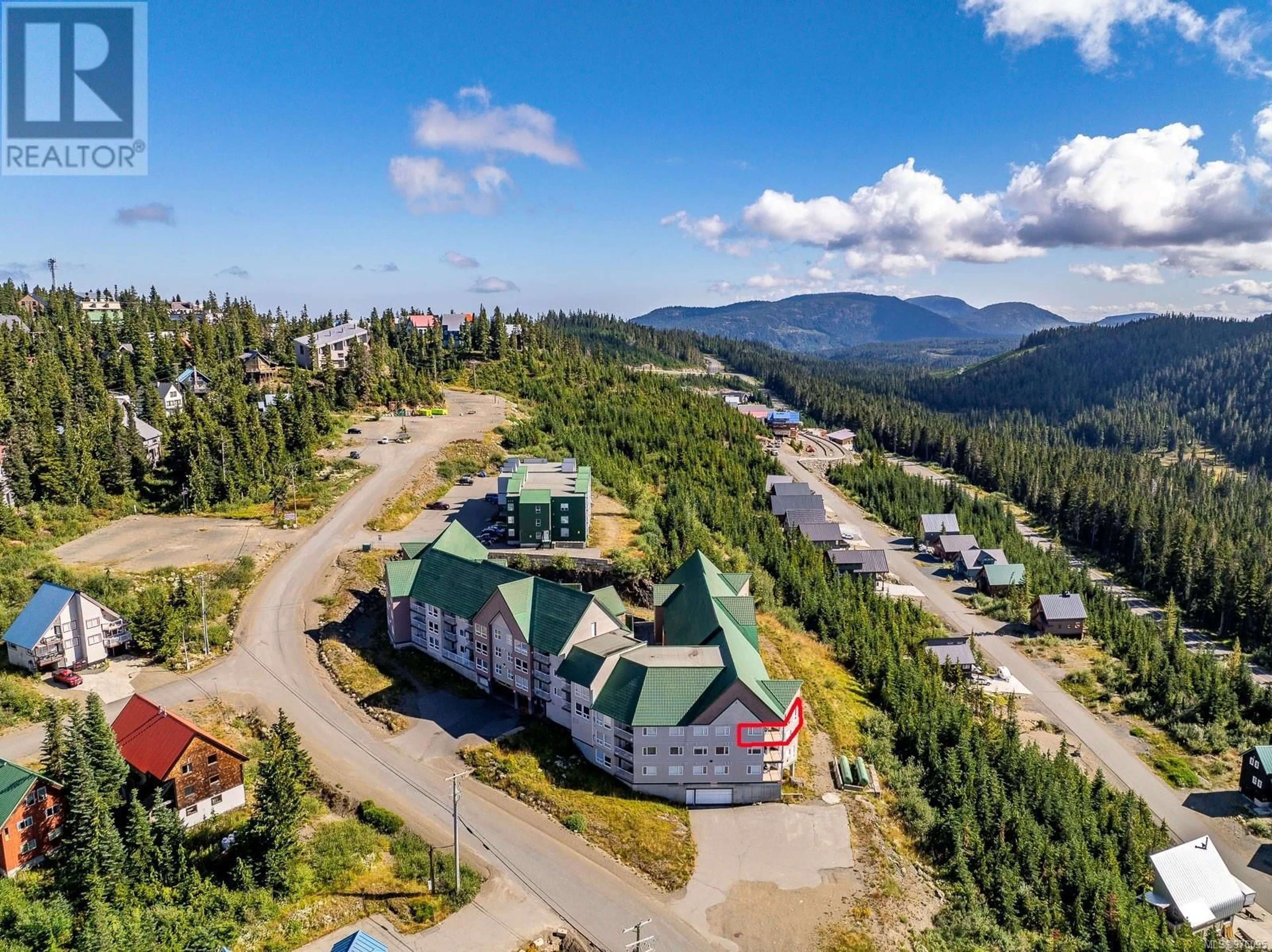 A pic from outside/outdoor area/front of a property/back of a property/a pic from drone, mountain view for 309 - 1201 HENRY ROAD, Courtenay British Columbia V9J1L0