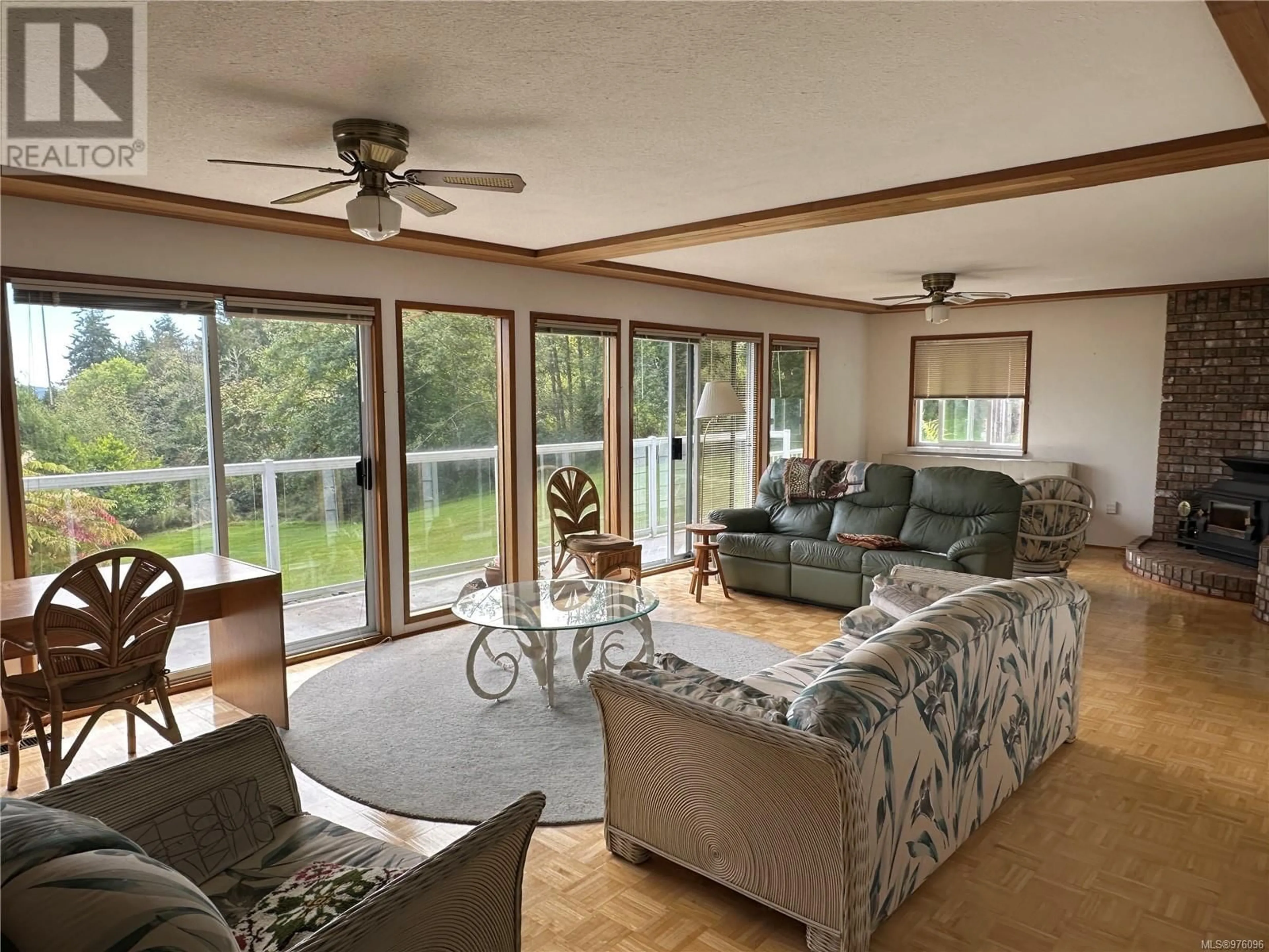 Living room, wood floors for 640 Isabella Point Rd, Salt Spring British Columbia V8K1V2